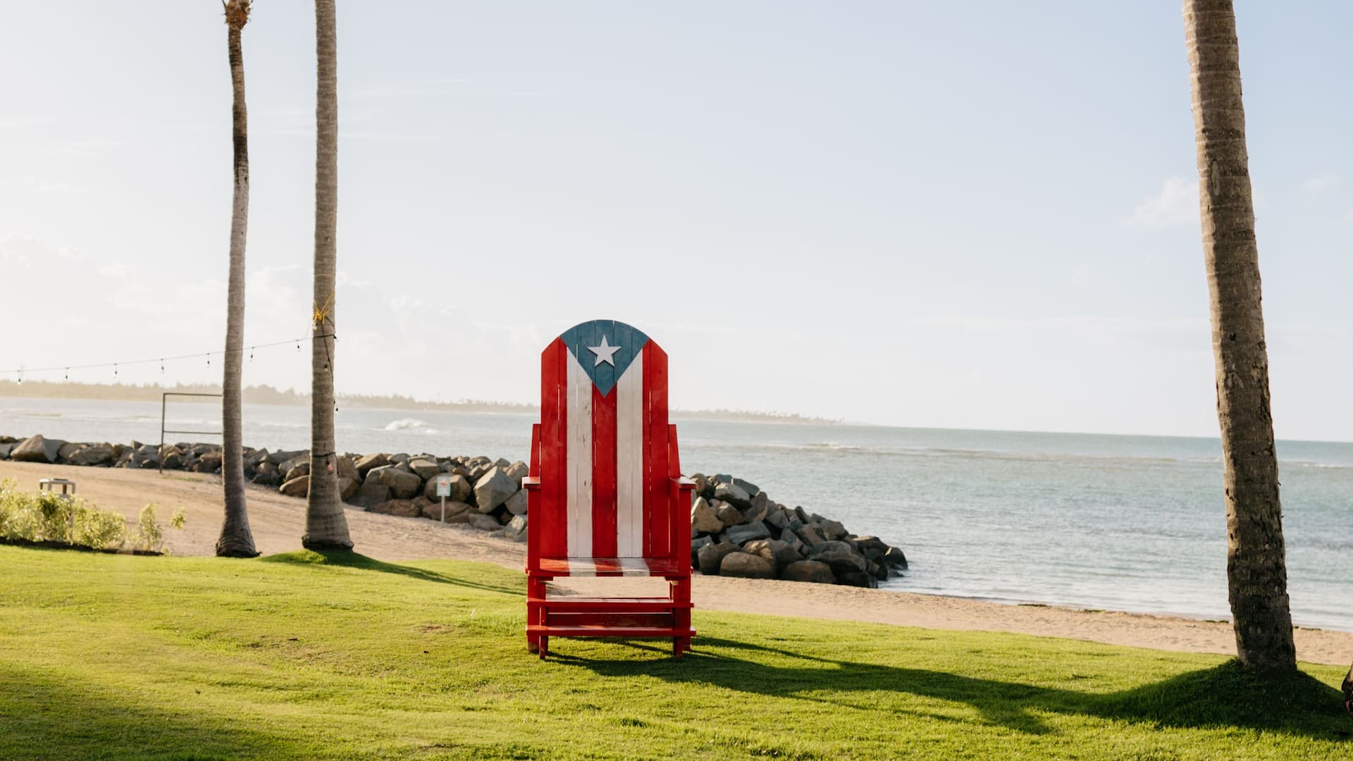 Hyatt Regency Grand Reserve Puerto Rico Chair With Flag By The Beach