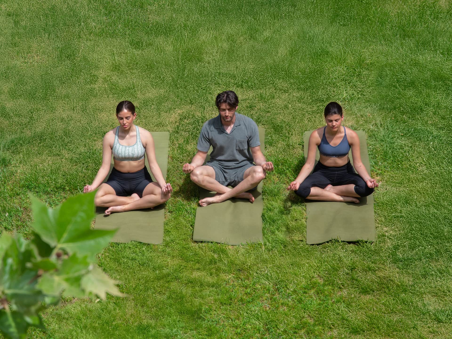 Hyatt Regency Thessaloniki Guest Meditating On Grass