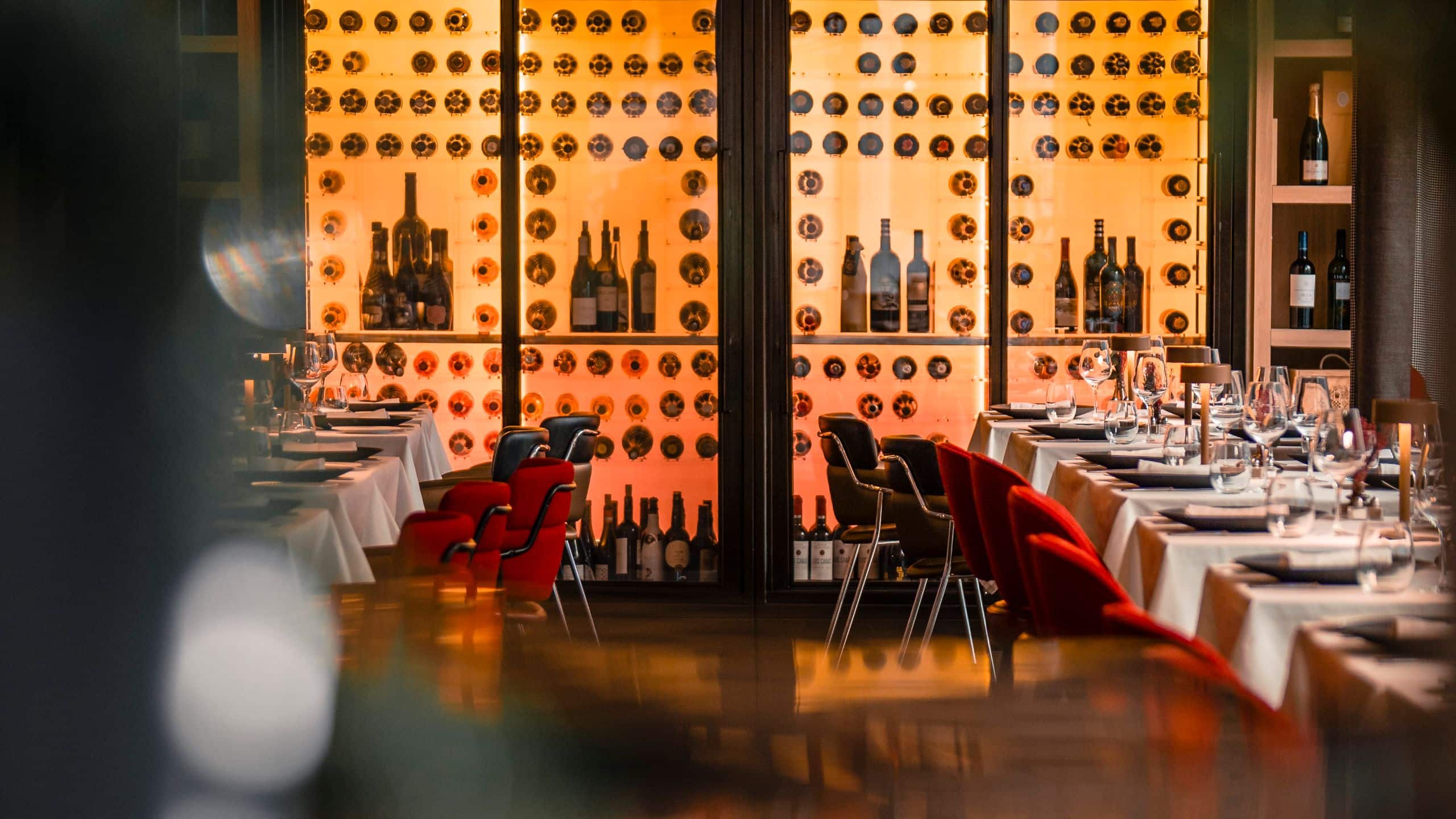 Hyatt Centric Gran Via Madrid Restaurant Seating With Wine Shelf