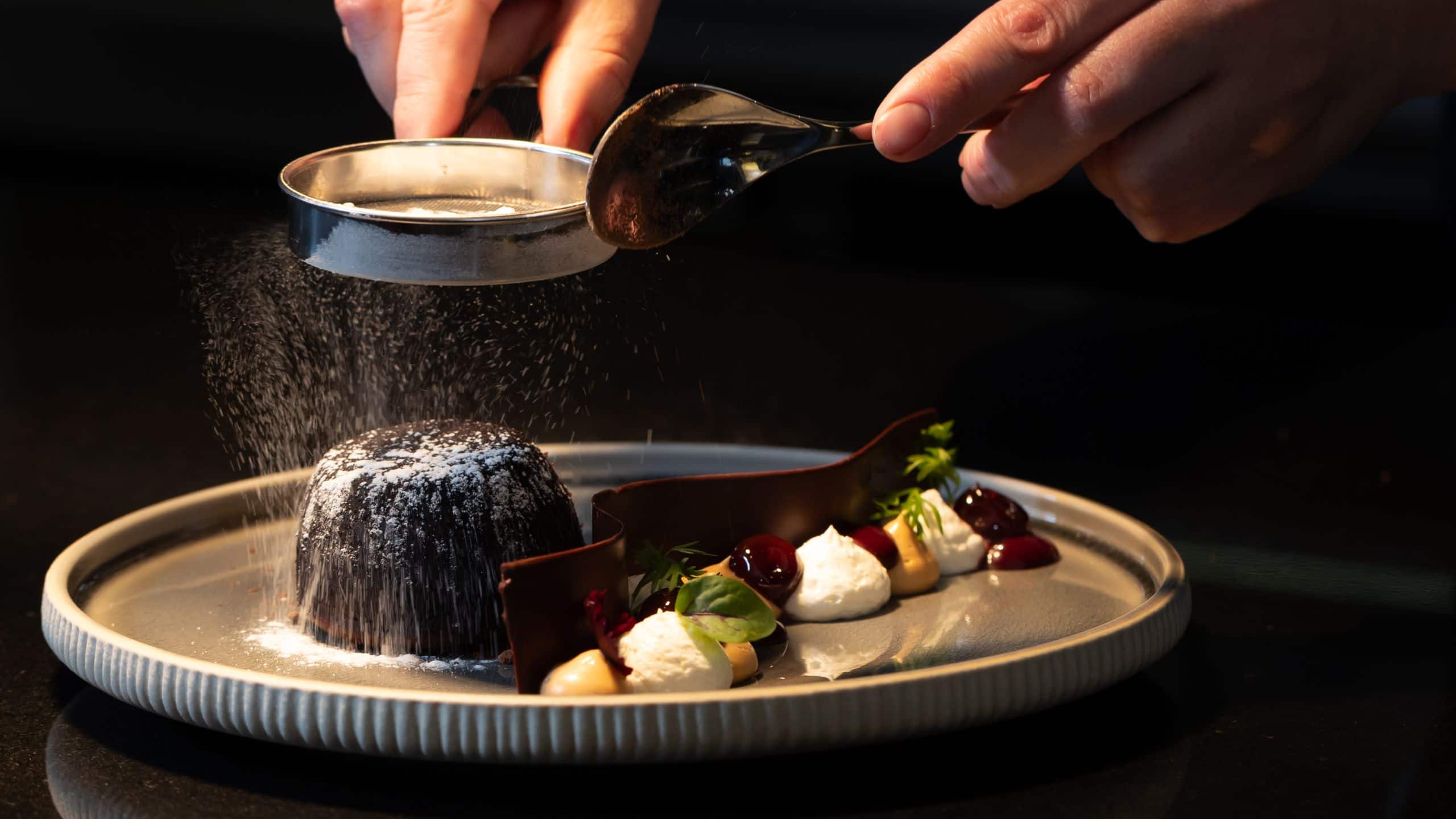 Park Hyatt Johannesburg Dusting Cocoa Powder On Chocolate Fondant