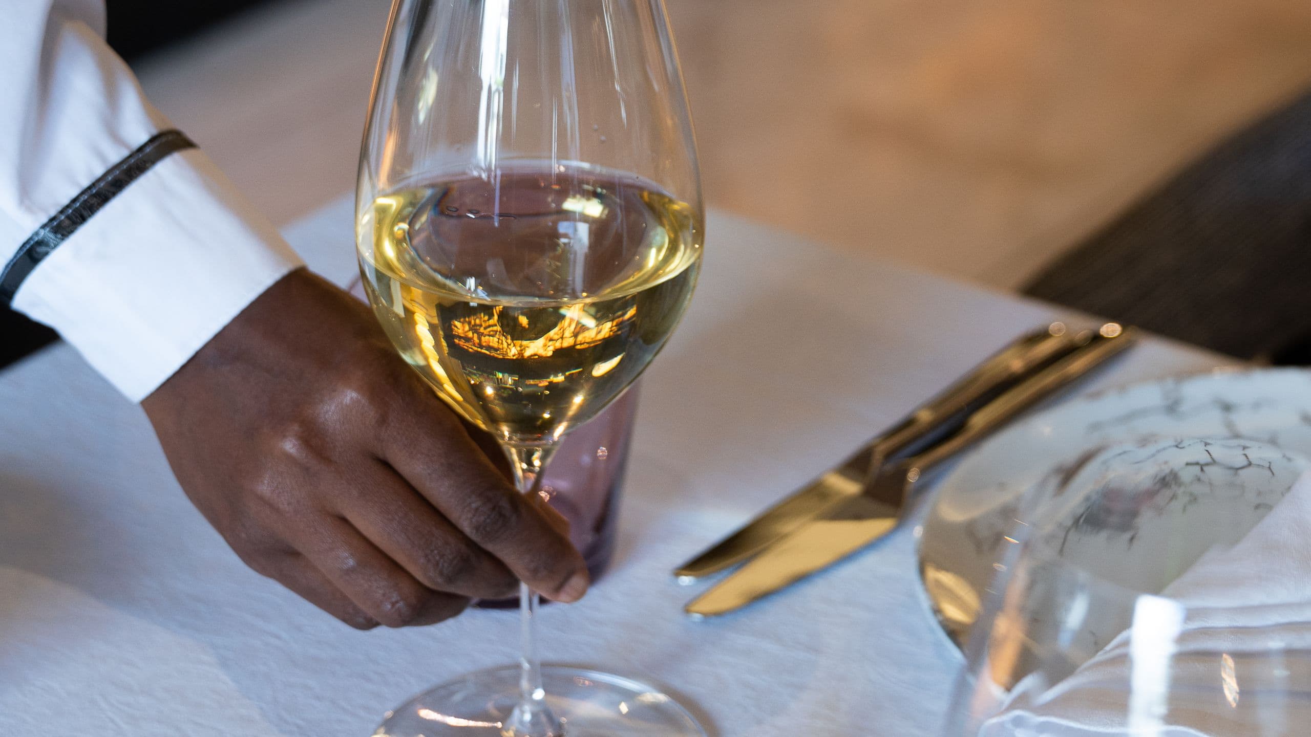 Park Hyatt Johannesburg Room 32 Waiter Serving A Glass Of White