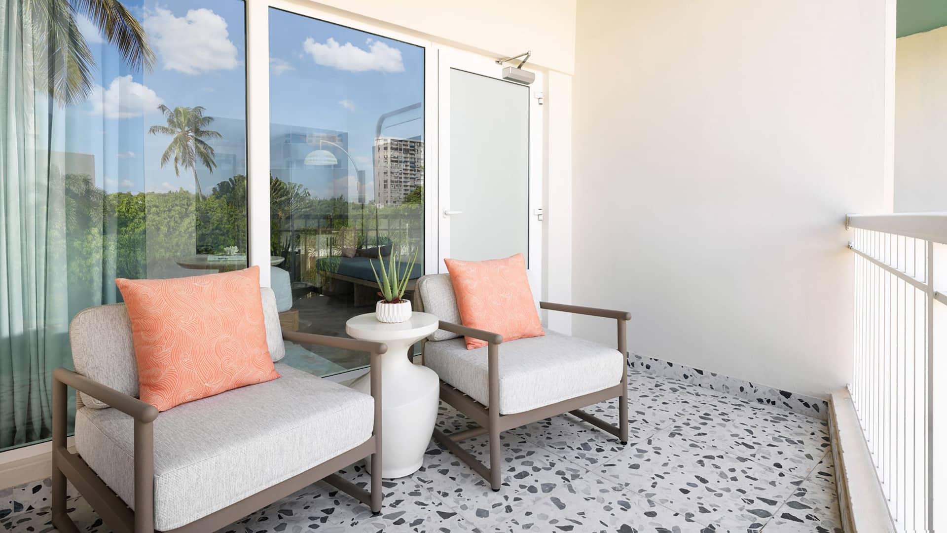 2 of 2 Hyatt Centric San Juan Isla Verde Guestroom Patio With Furnishings