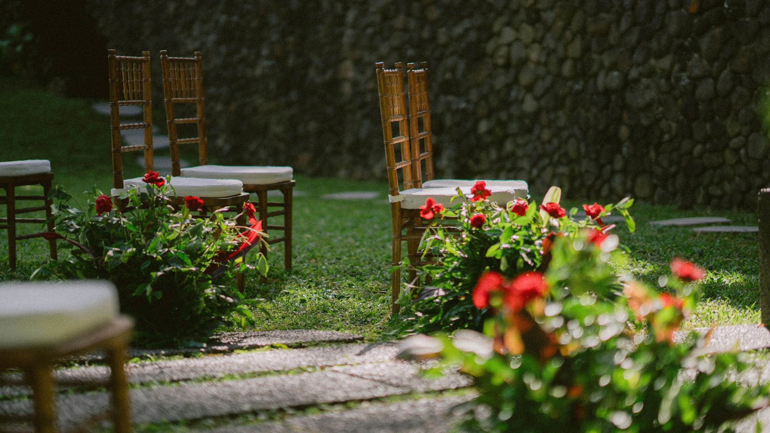 Alila Ubud Wedding Aisle Red Flower Arrangements