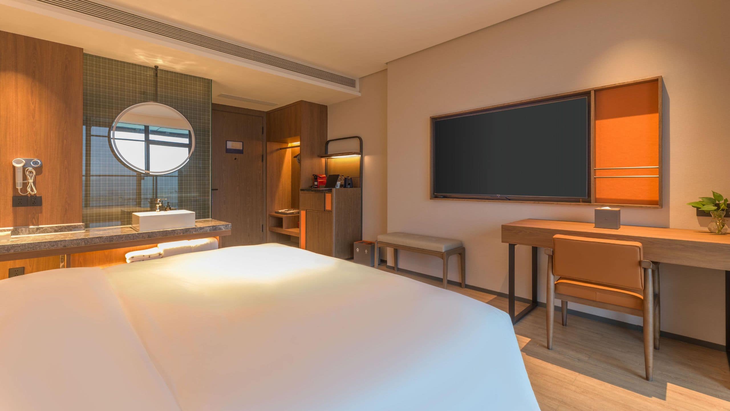 3 of 6 UrCove Chongqing Yubei Business Deluxe King Tv