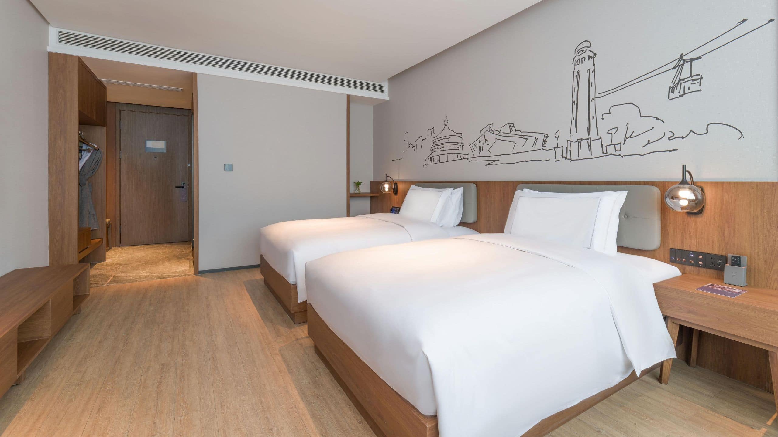 2 of 8 UrCove Chongqing Yubei Business Deluxe Twin Beds