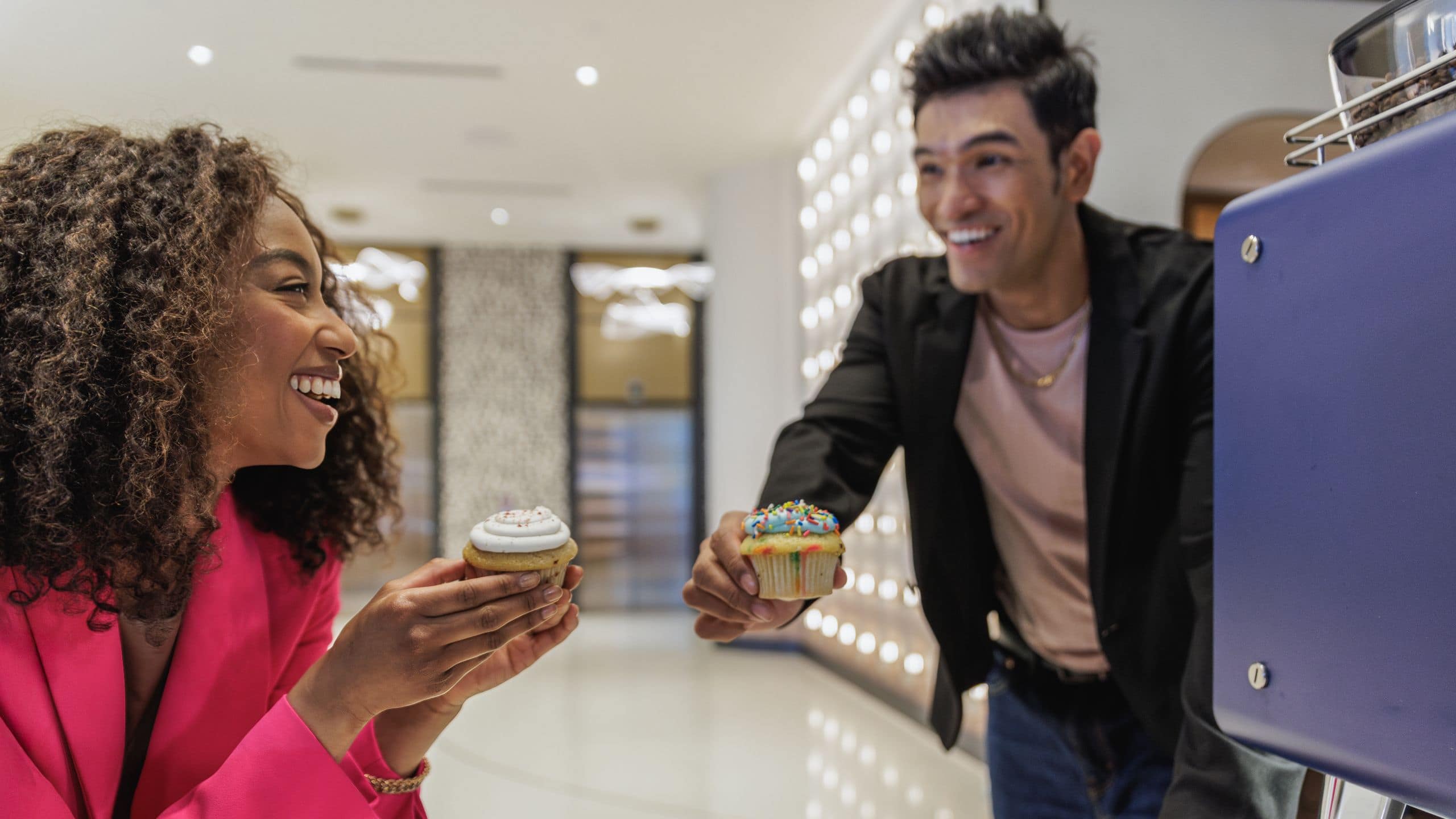 Hyatt Centric Chicago O’Hare Couple Eating Cupcakes