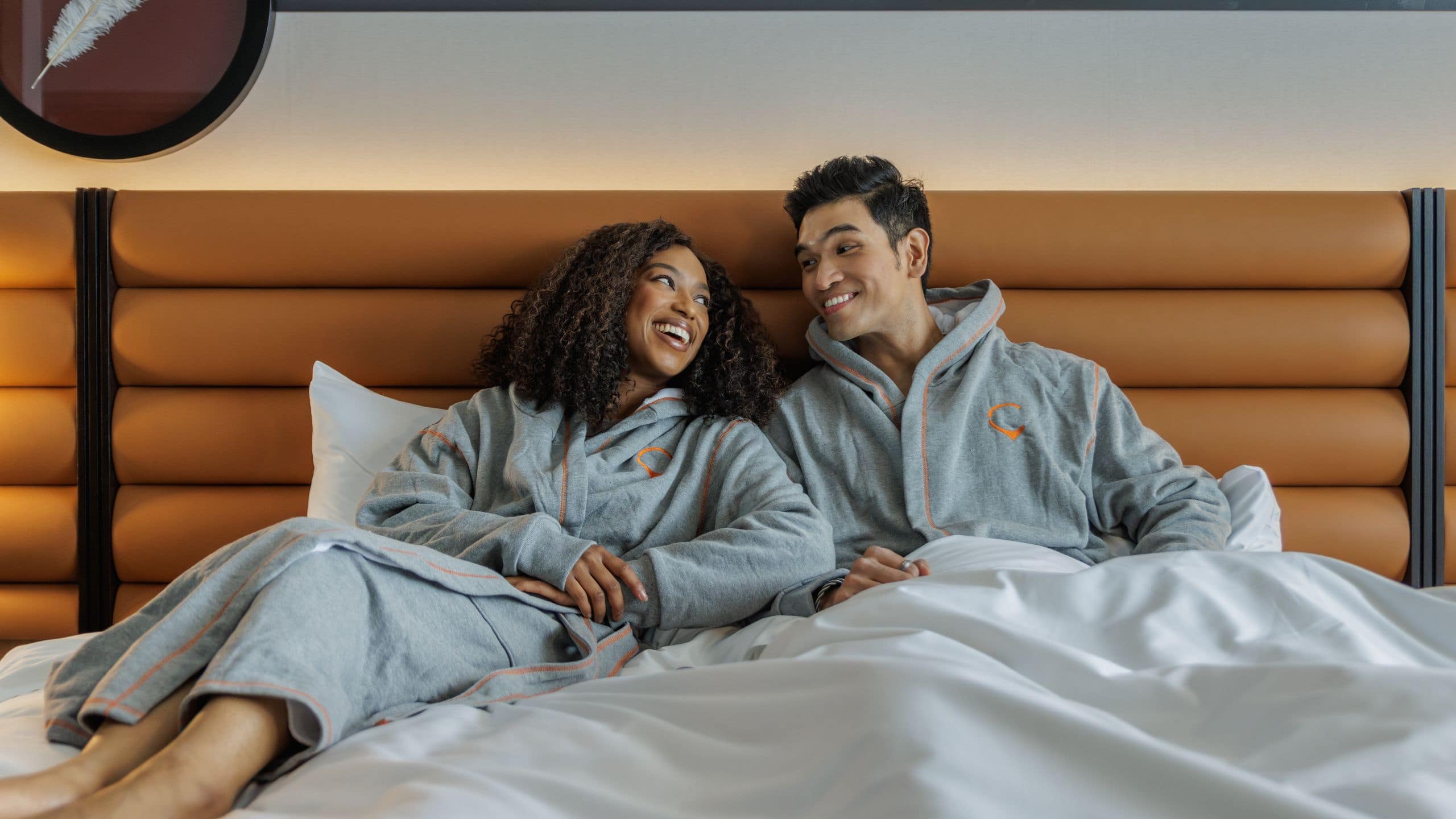 Hyatt Centric Chicago O’Hare Couple In Robes On King Bed