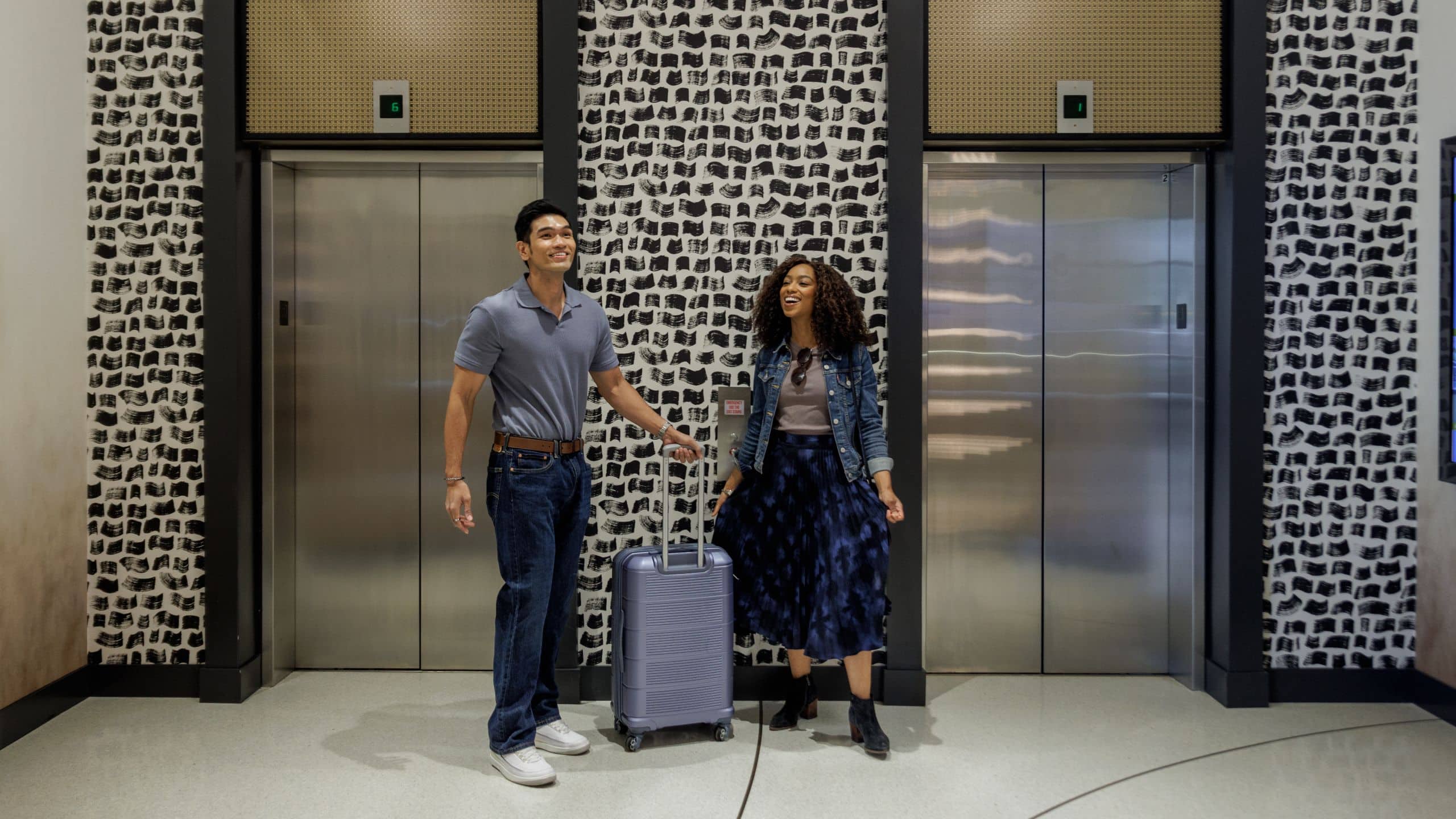 Hyatt Centric Chicago O’Hare Couple At Elevator Bank