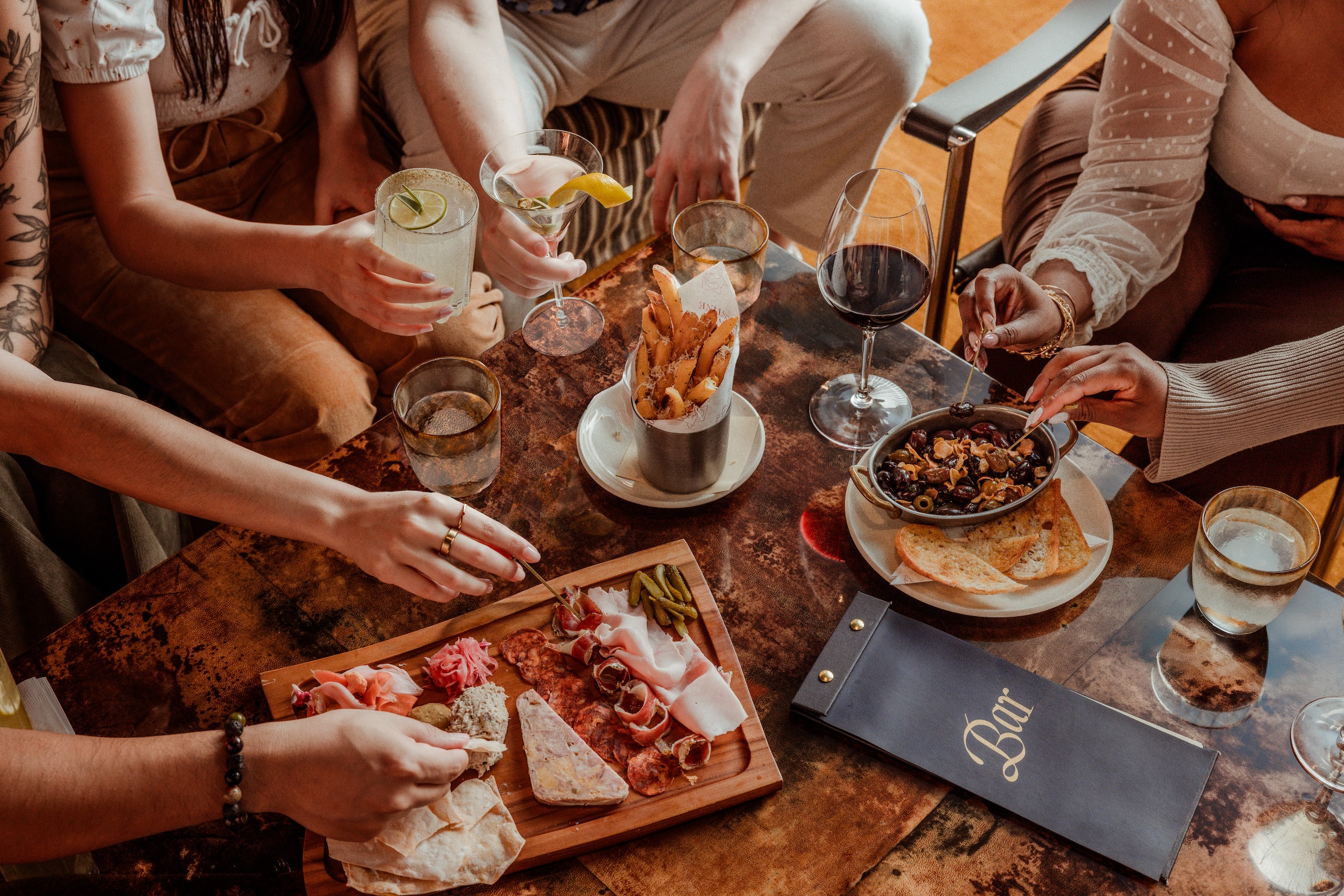 Hotel Saint Augustine, Bunkhouse Hotels Lounge Appetizers And Drinks Spread