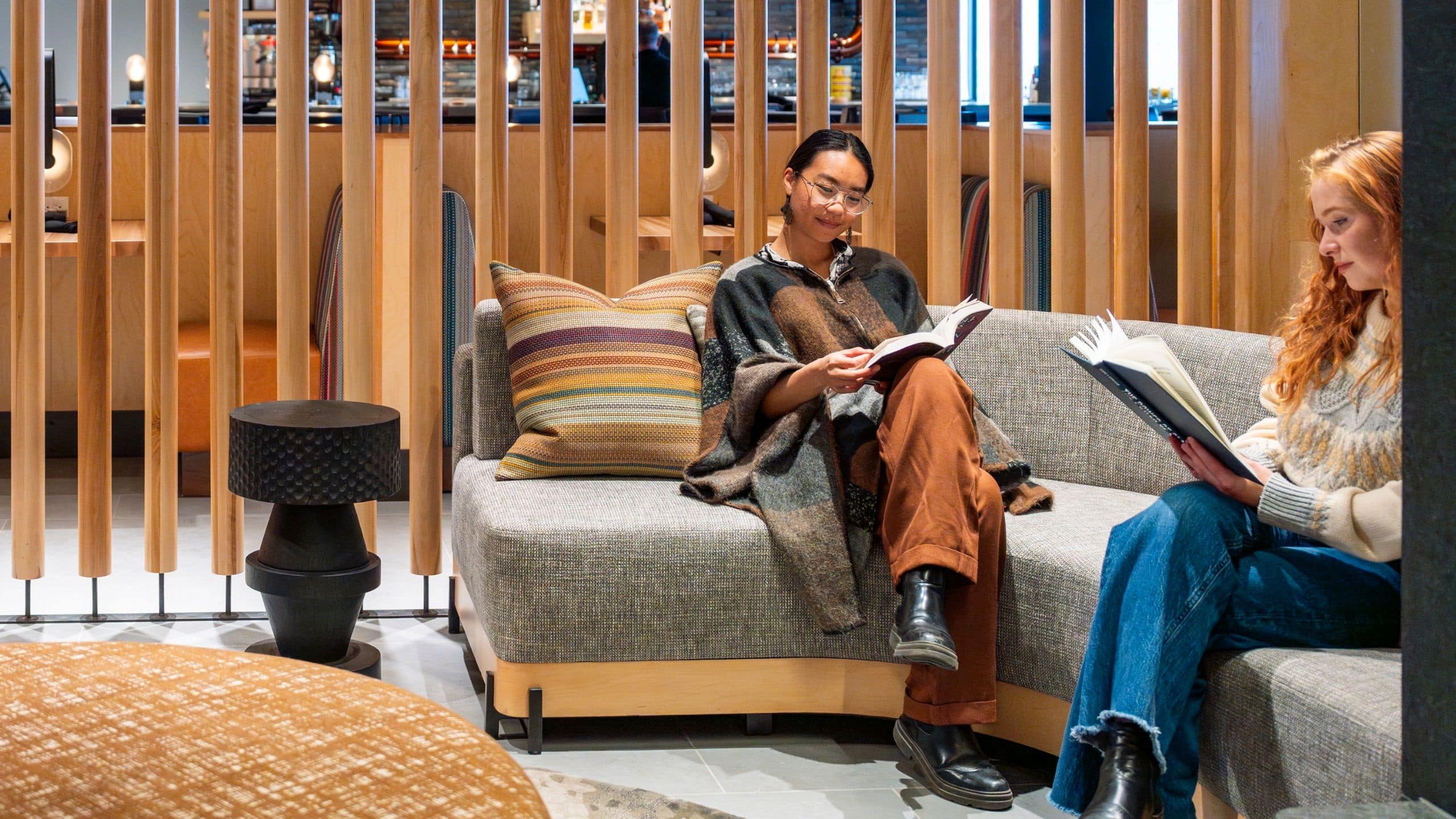 The Wildbirch Hotel Guests Reading In Lobby