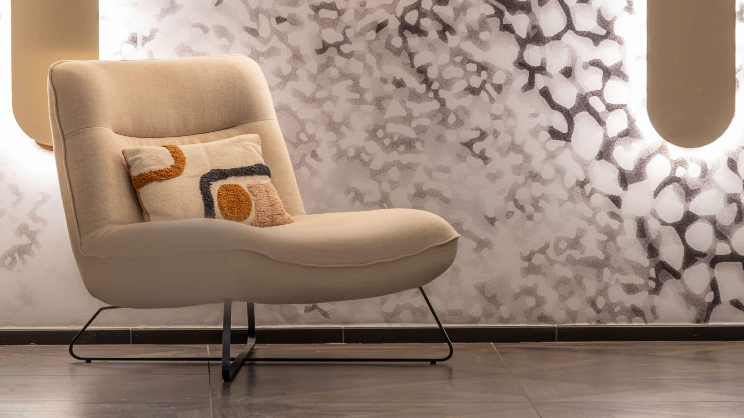 FirstName Toulouse A Chair Against The Lit Backwall