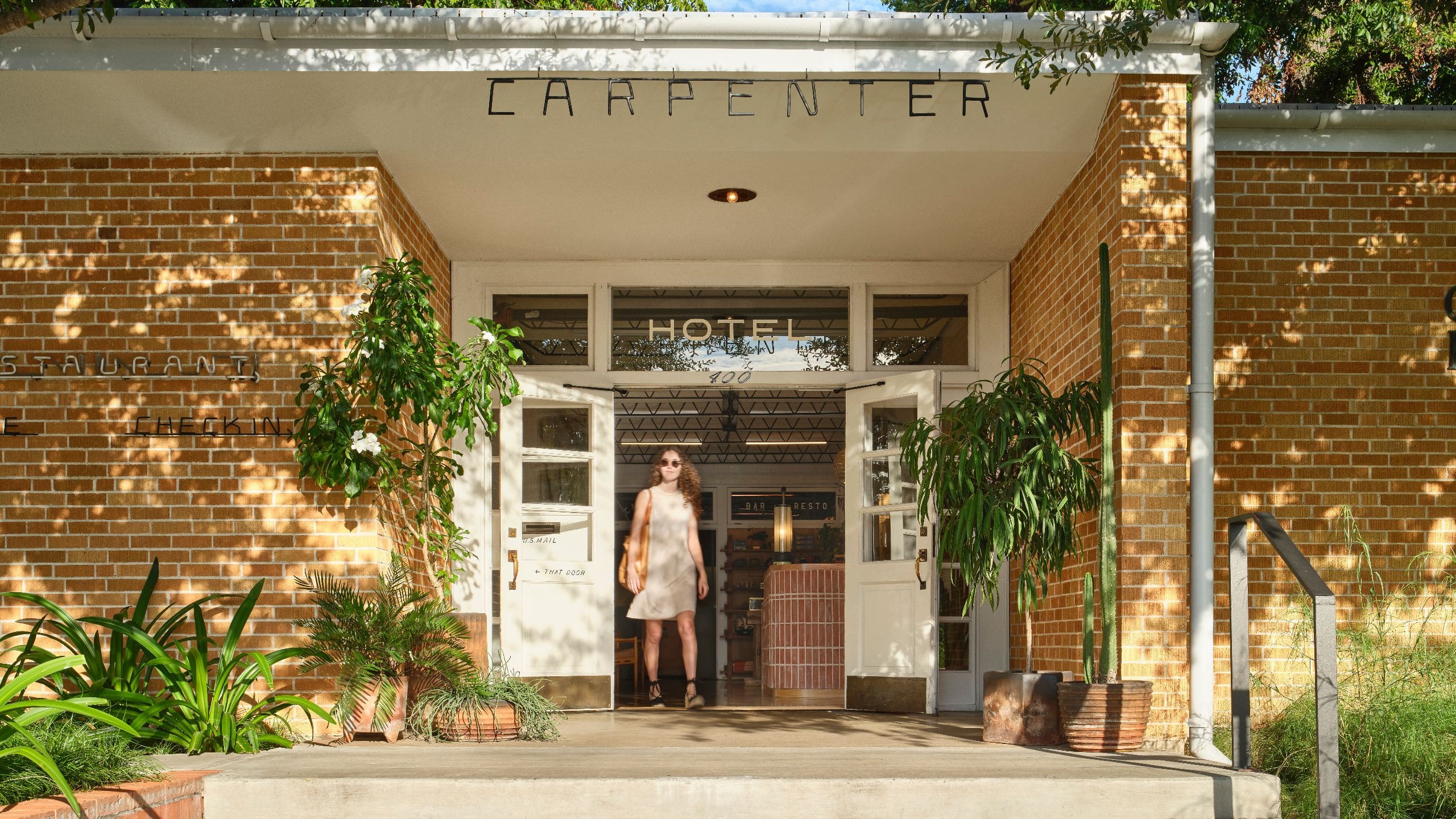 Carpenter Hotel, Bunkhouse Hotels Entrance Walking