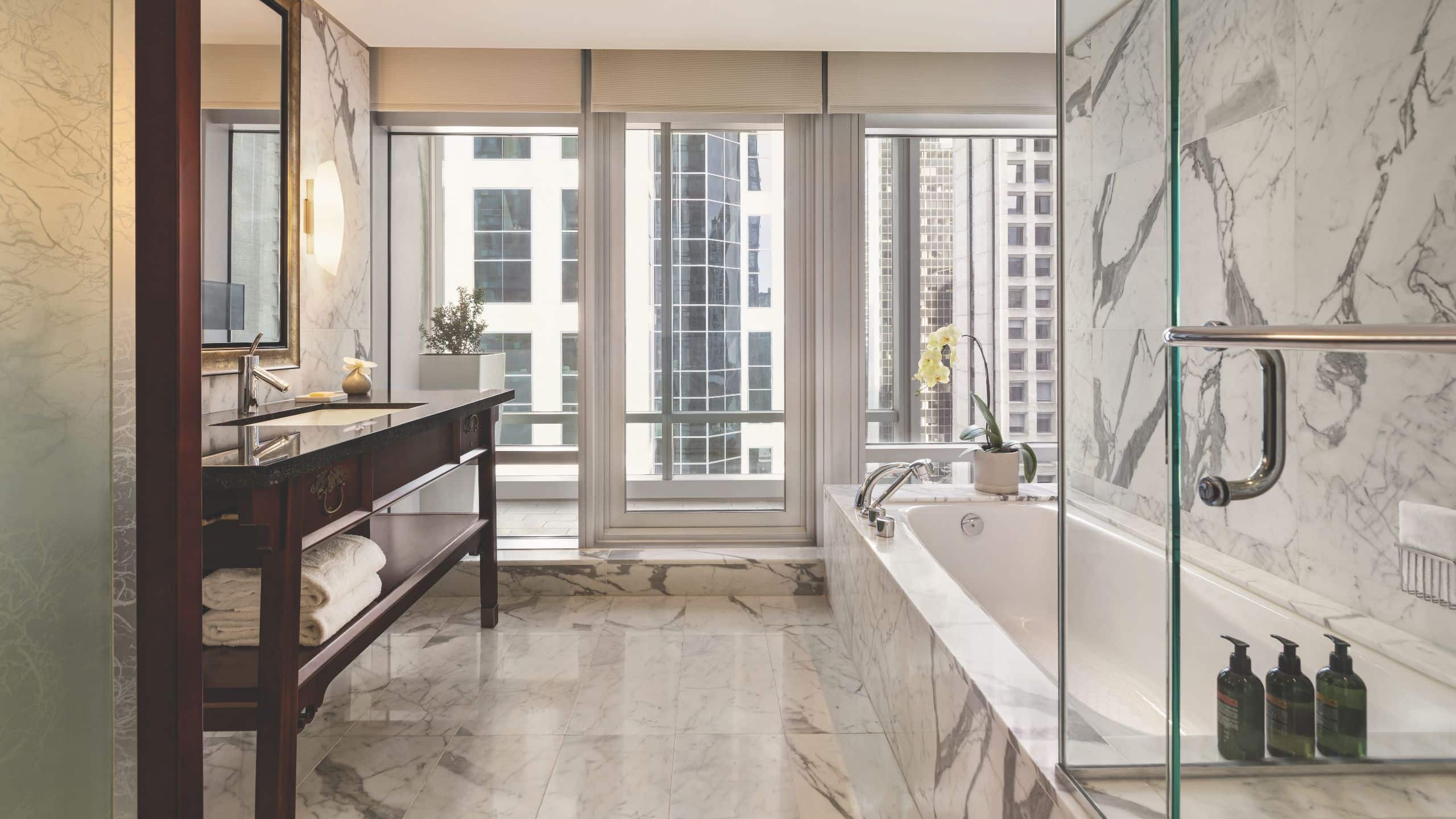 2 of 3 Hyatt Vancouver Downtown Alberni One King Bed Deluxe Balcony Guestroom Bathroom Tub