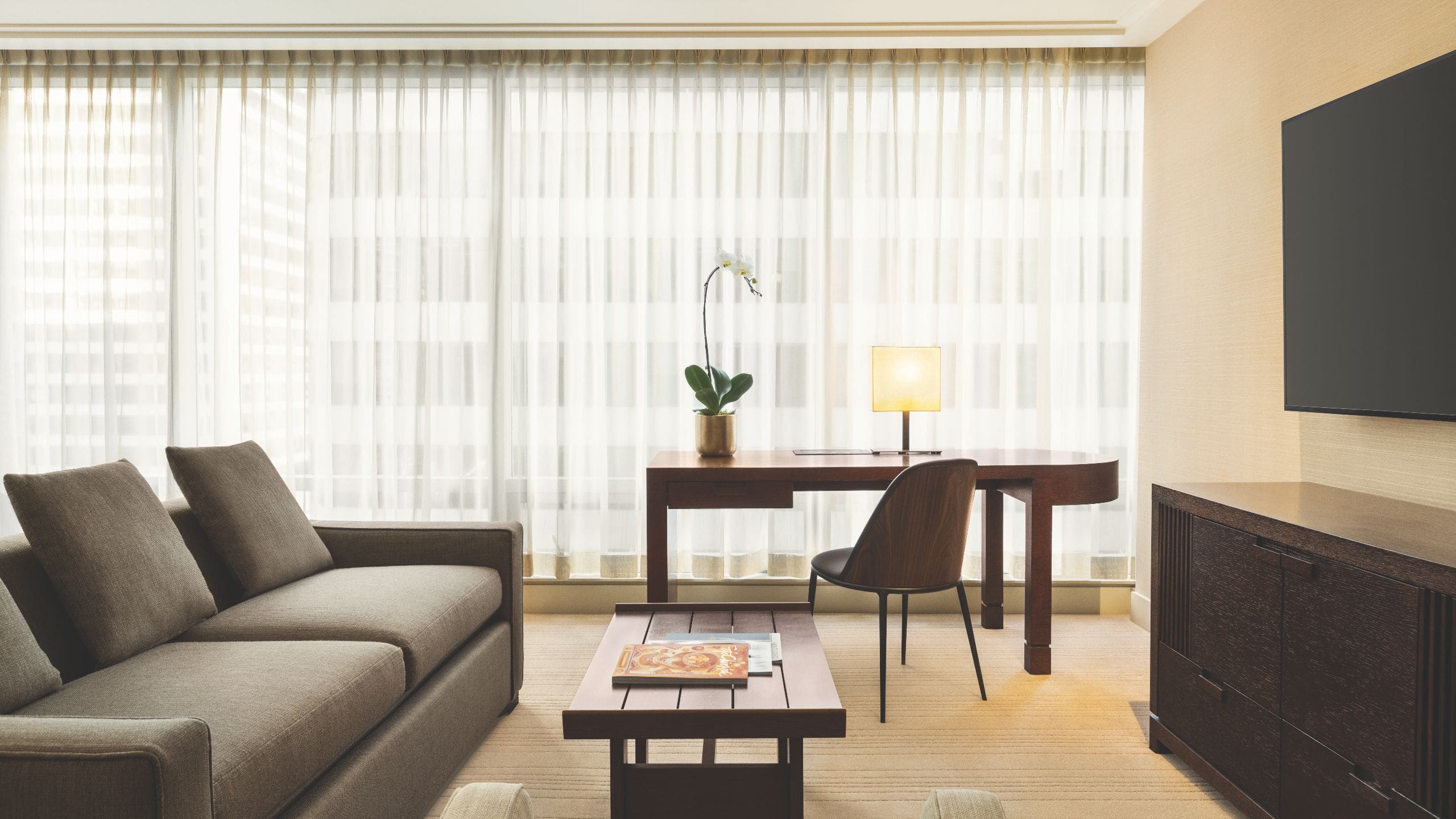 2 of 3 Hyatt Vancouver Downtown Alberni Guestroom Living And Desk Area