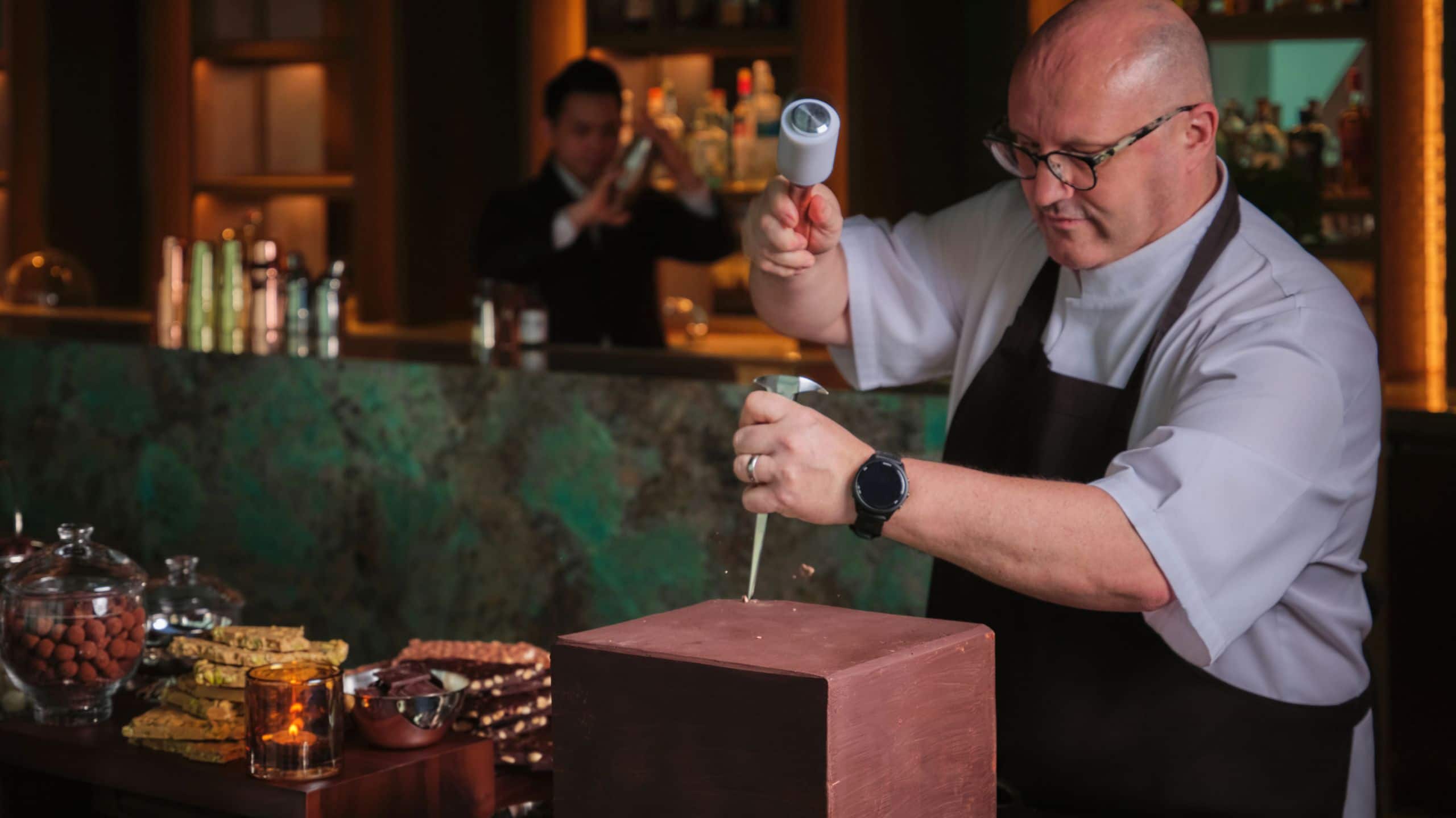 Park Hyatt Kuala Lumpur Chef Chiseling Chocolate Block Landscape