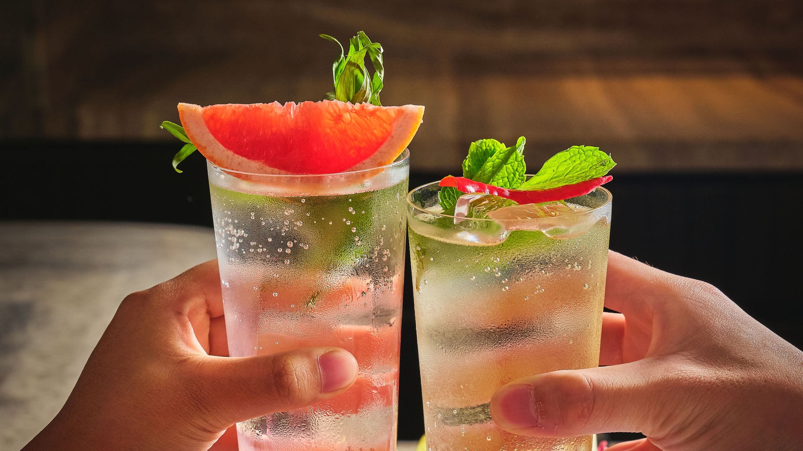 Park Hyatt Kuala Lumpur Merdeka Grill Cocktail Hands Cheers Vertical
