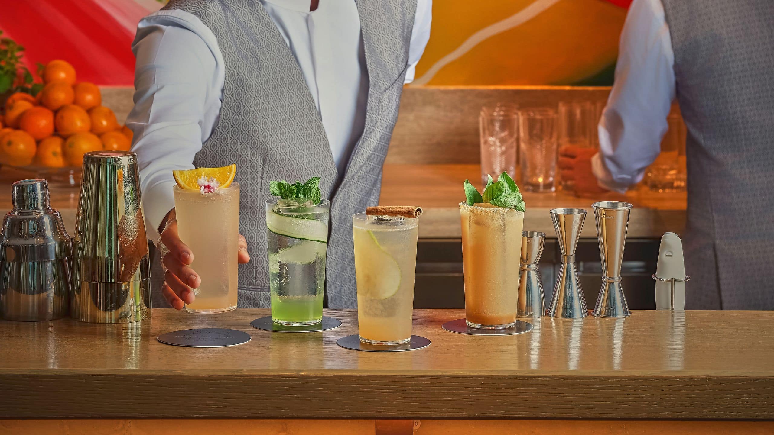 Park Hyatt Kuala Lumpur Staff Presenting Zero Poof Cocktails Vertical