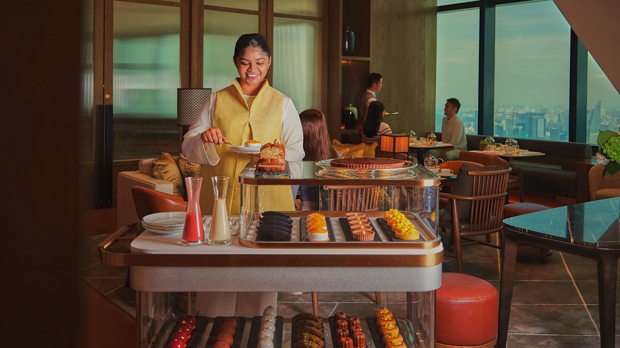 Park Hyatt Kuala Lumpur Staff Serving Dessert Trolley