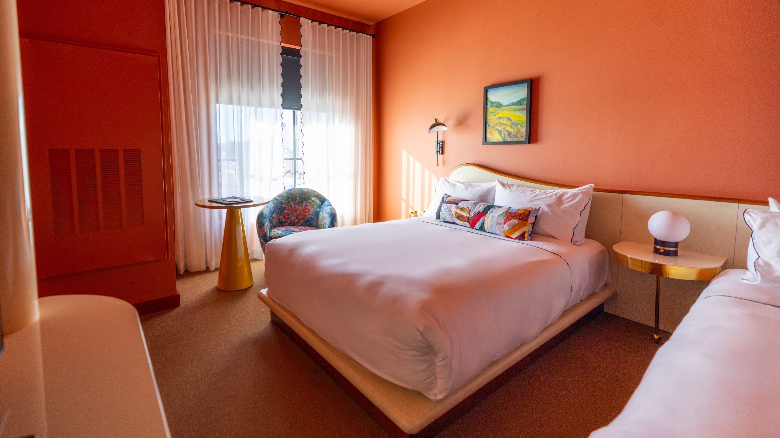 Hotel Genevieve Two Queens Guestroom And Window Seating Area