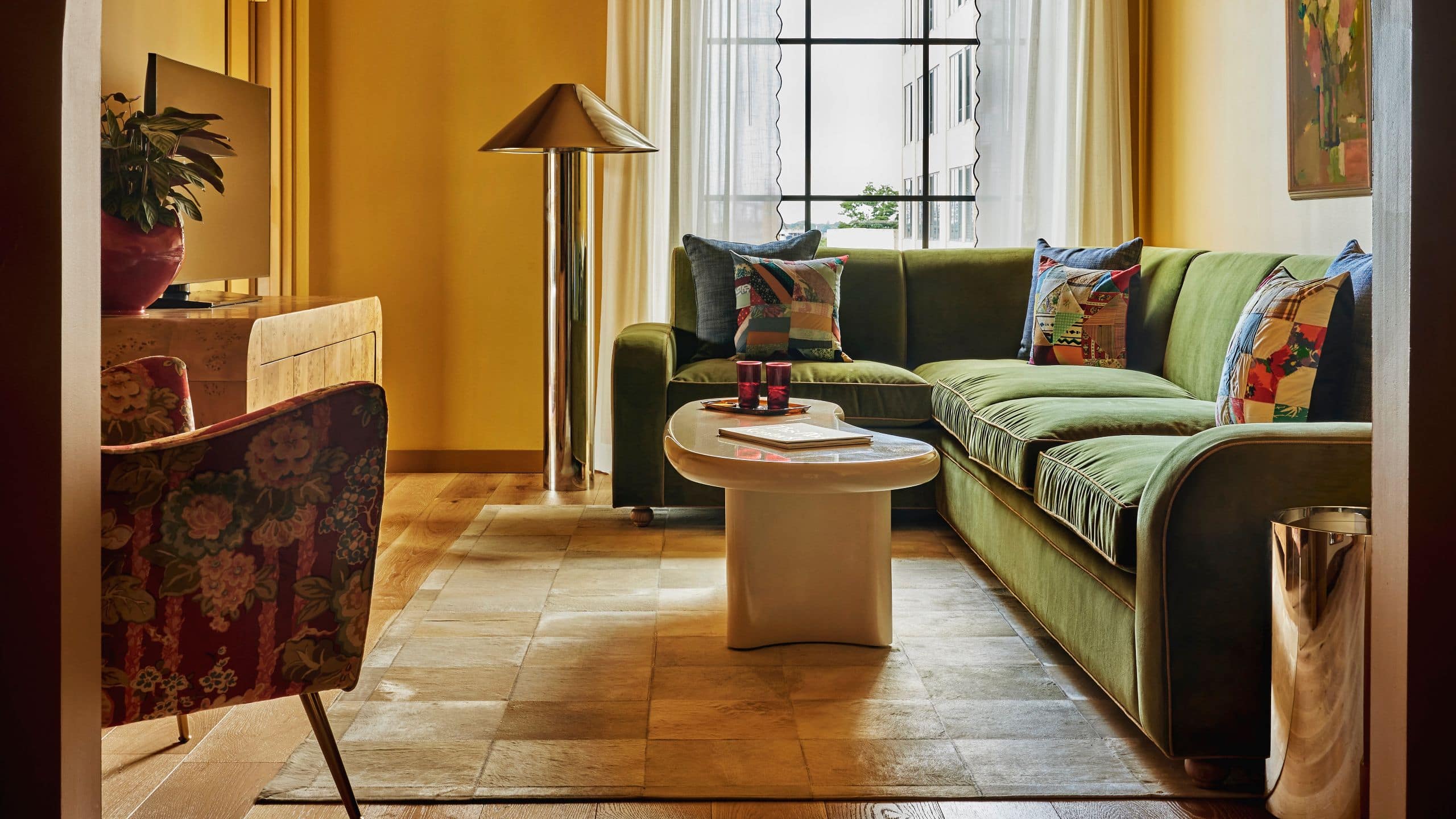 Hotel Genevieve Suite Living Room Arched Entry