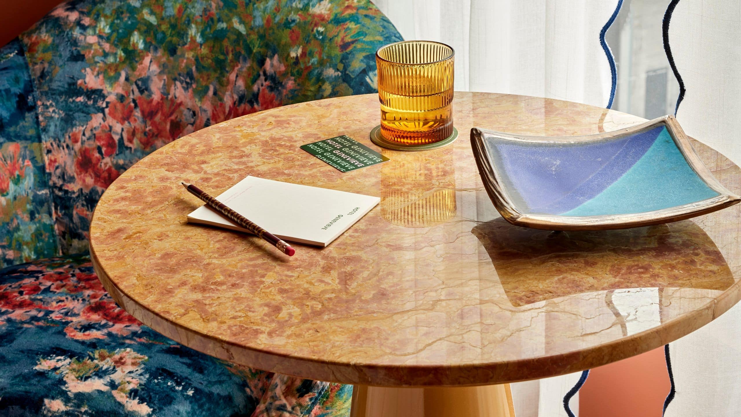 4 of 5 Hotel Genevieve Two Queens Guestroom Seating Area