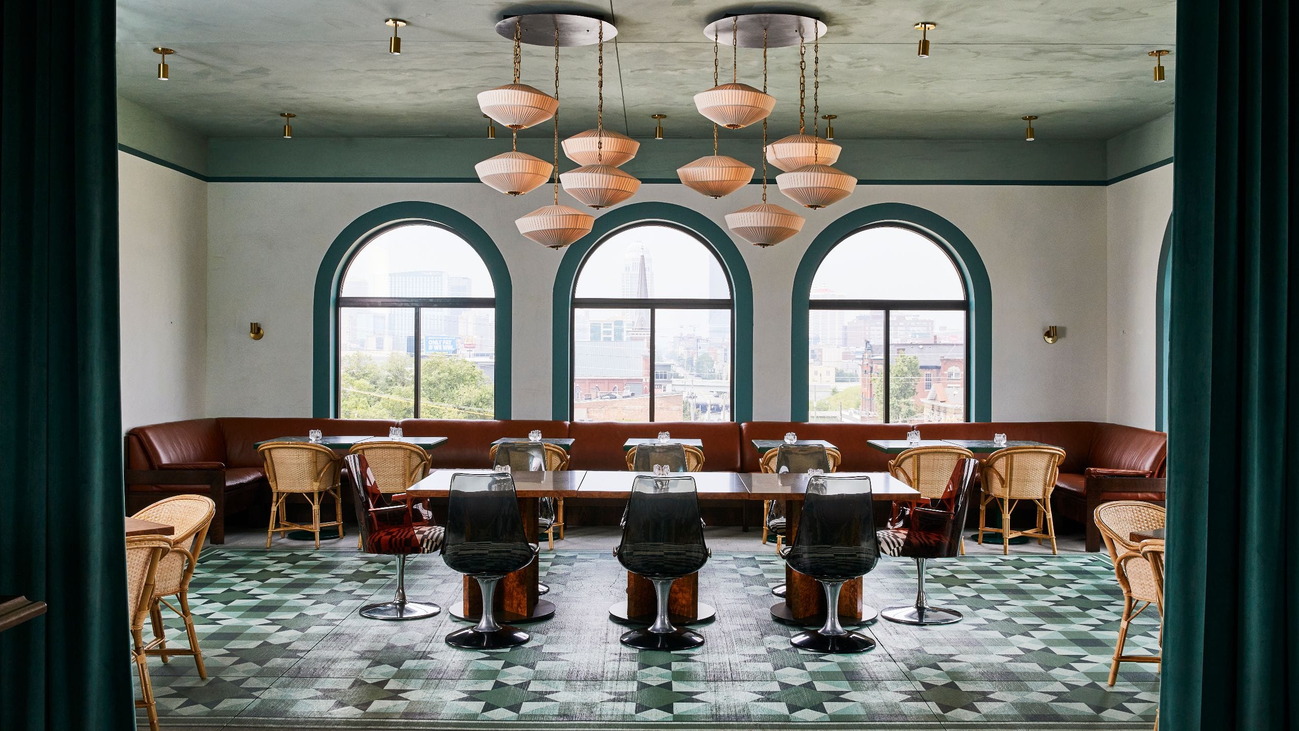 Hotel Genevieve Bar Genevieve Seating Area And Arched Windows