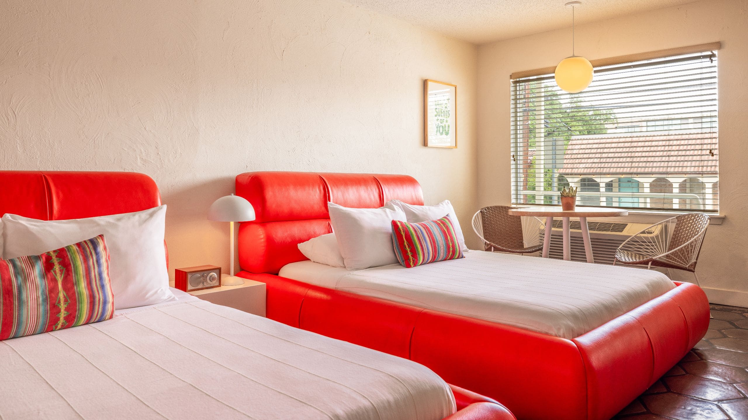 Austin Motel, Bunkhouse Hotels Double Queen Beds Table And Chairs