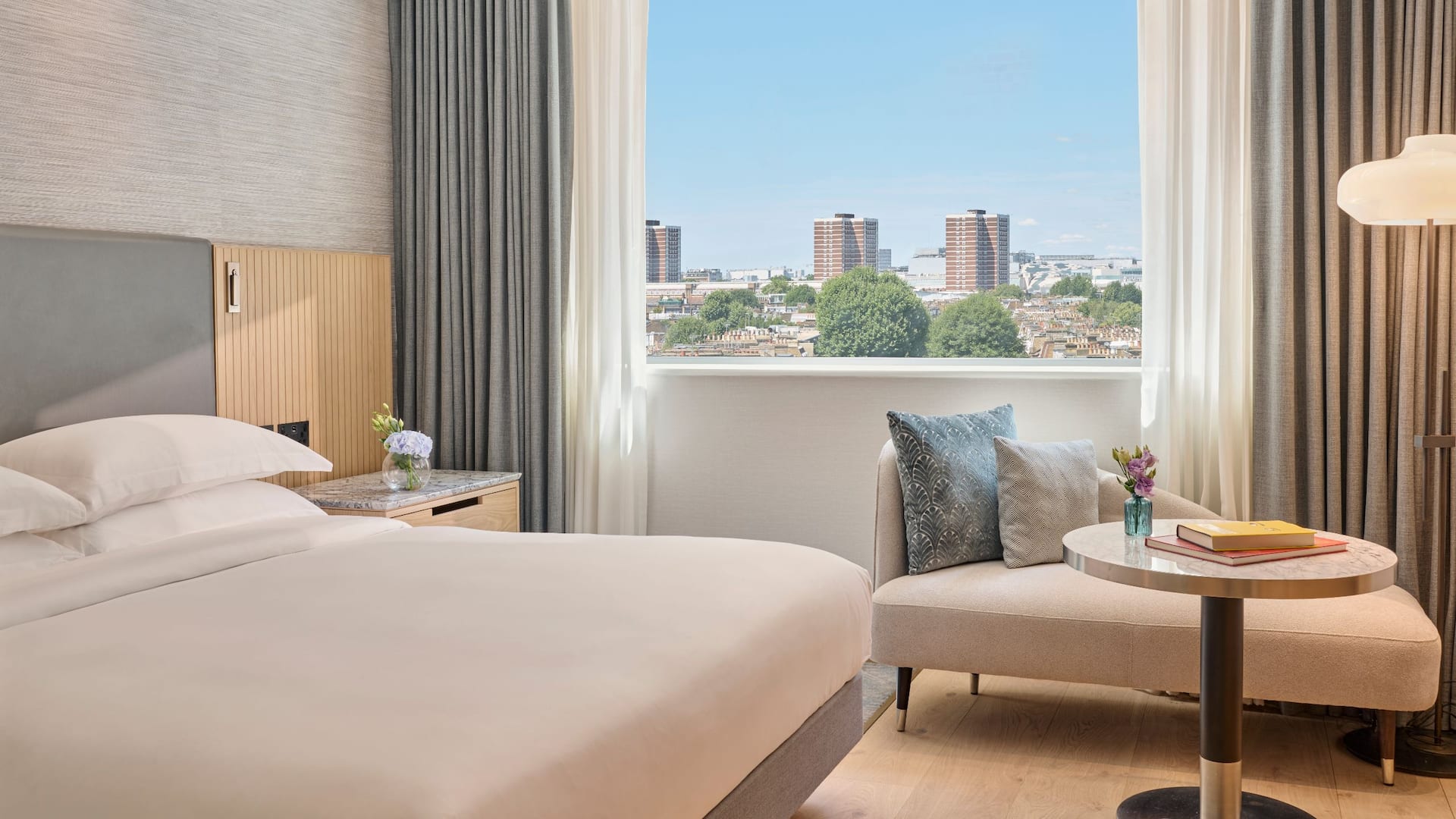 Hyatt Regency London Olympia Guestroom Bed And Sofa With View