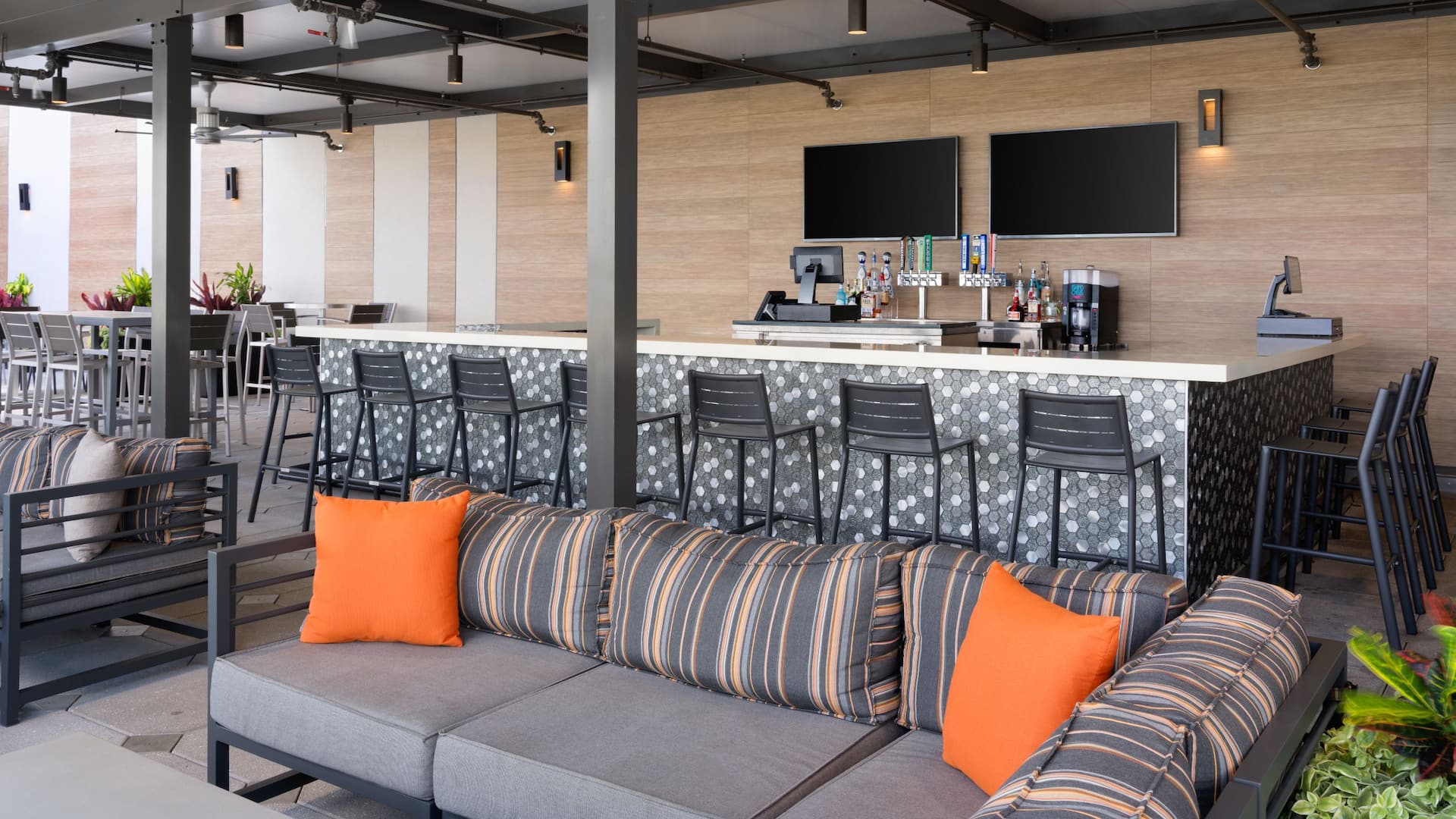 5 of 8 Hyatt Place Melbourne Airport Runway Rooftop Bar And Couches