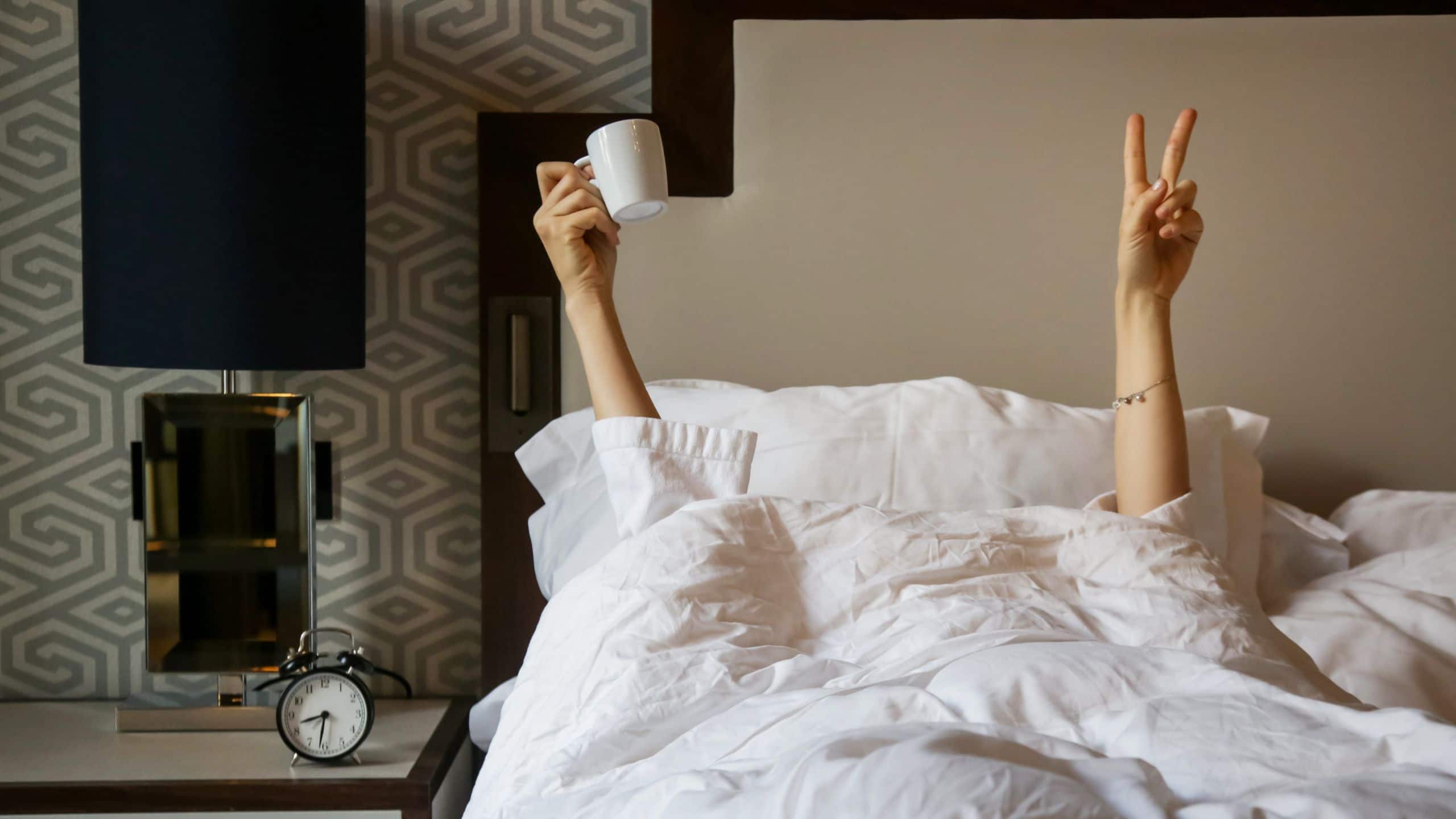 Person In Bed Waking Up