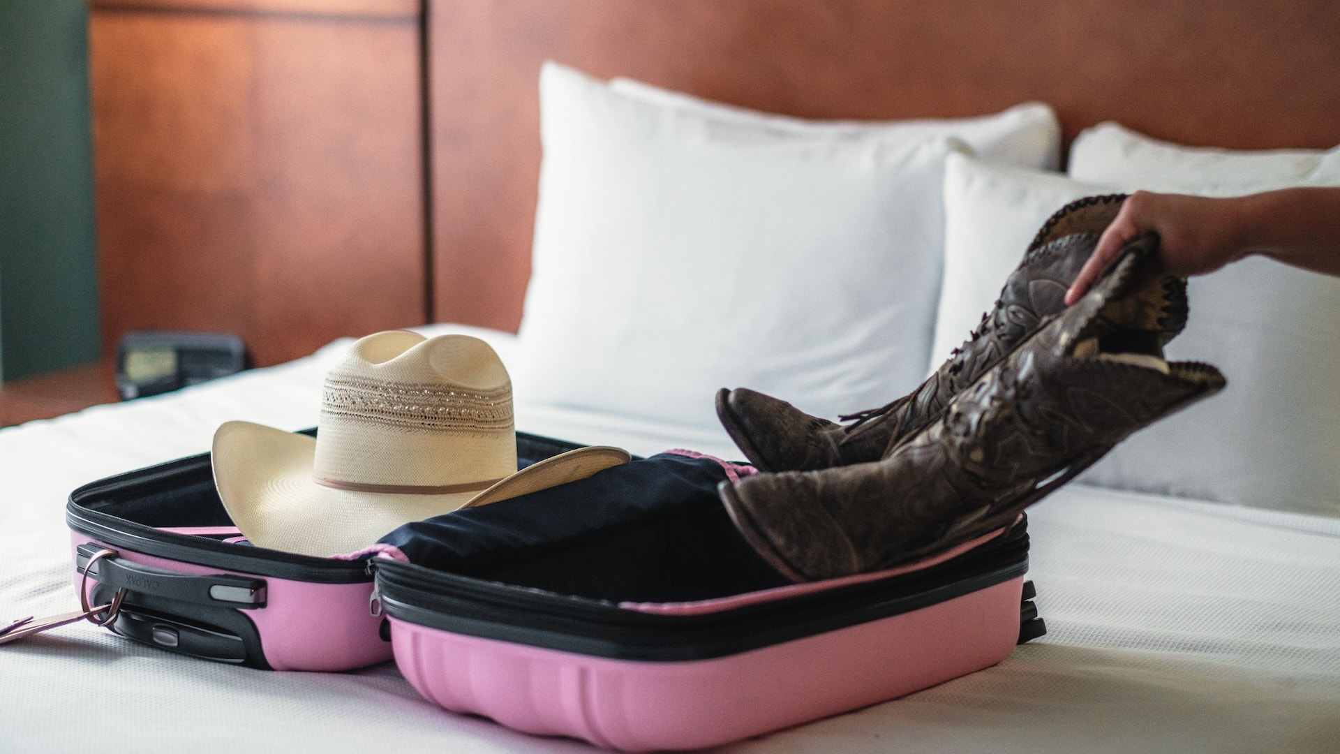 Hyatt Place Fort Worth Historic Stockyards Boots Hat On Bed