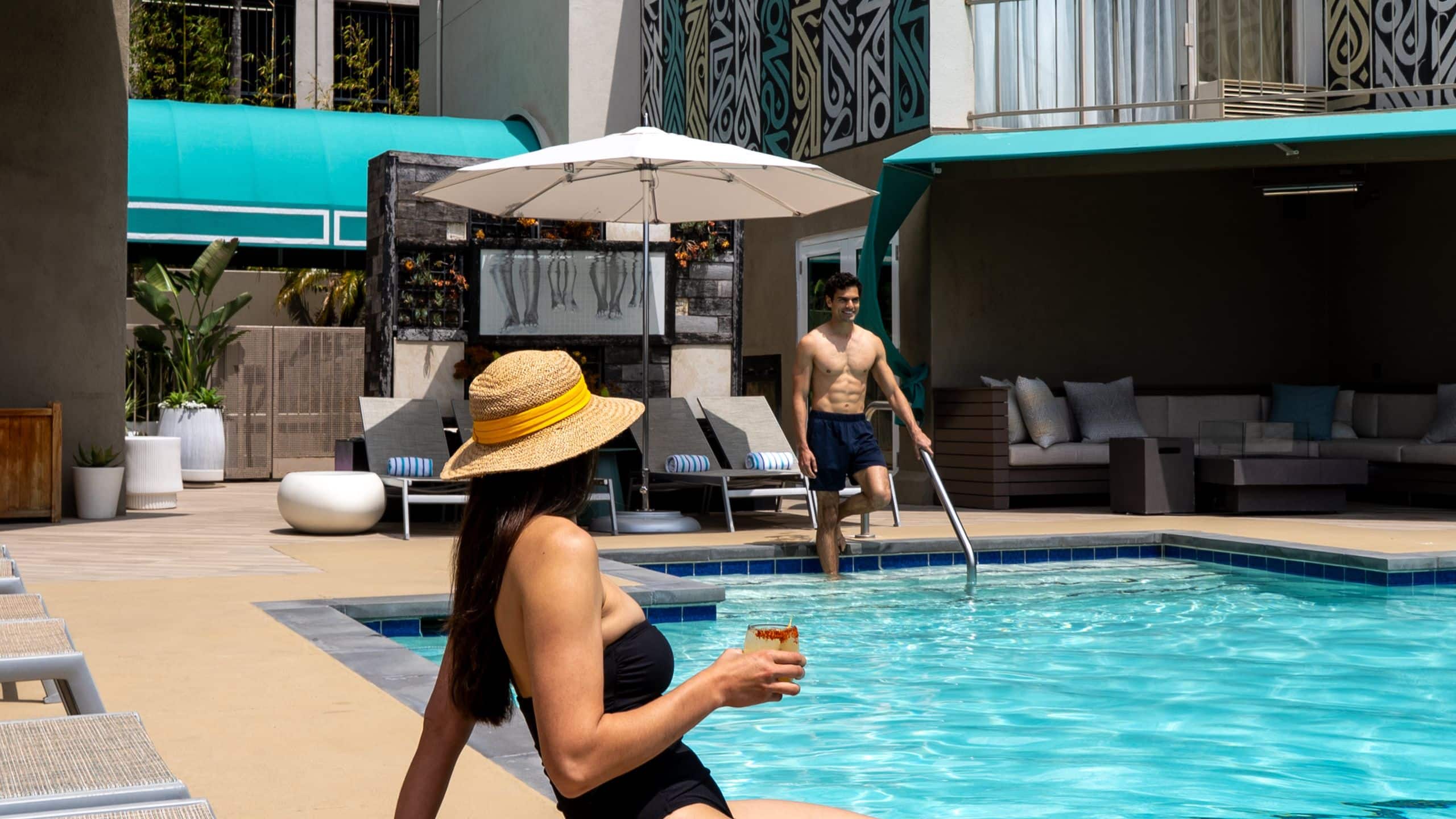Hyatt Centric Delfina Santa Monica Woman Poolside With Cocktail