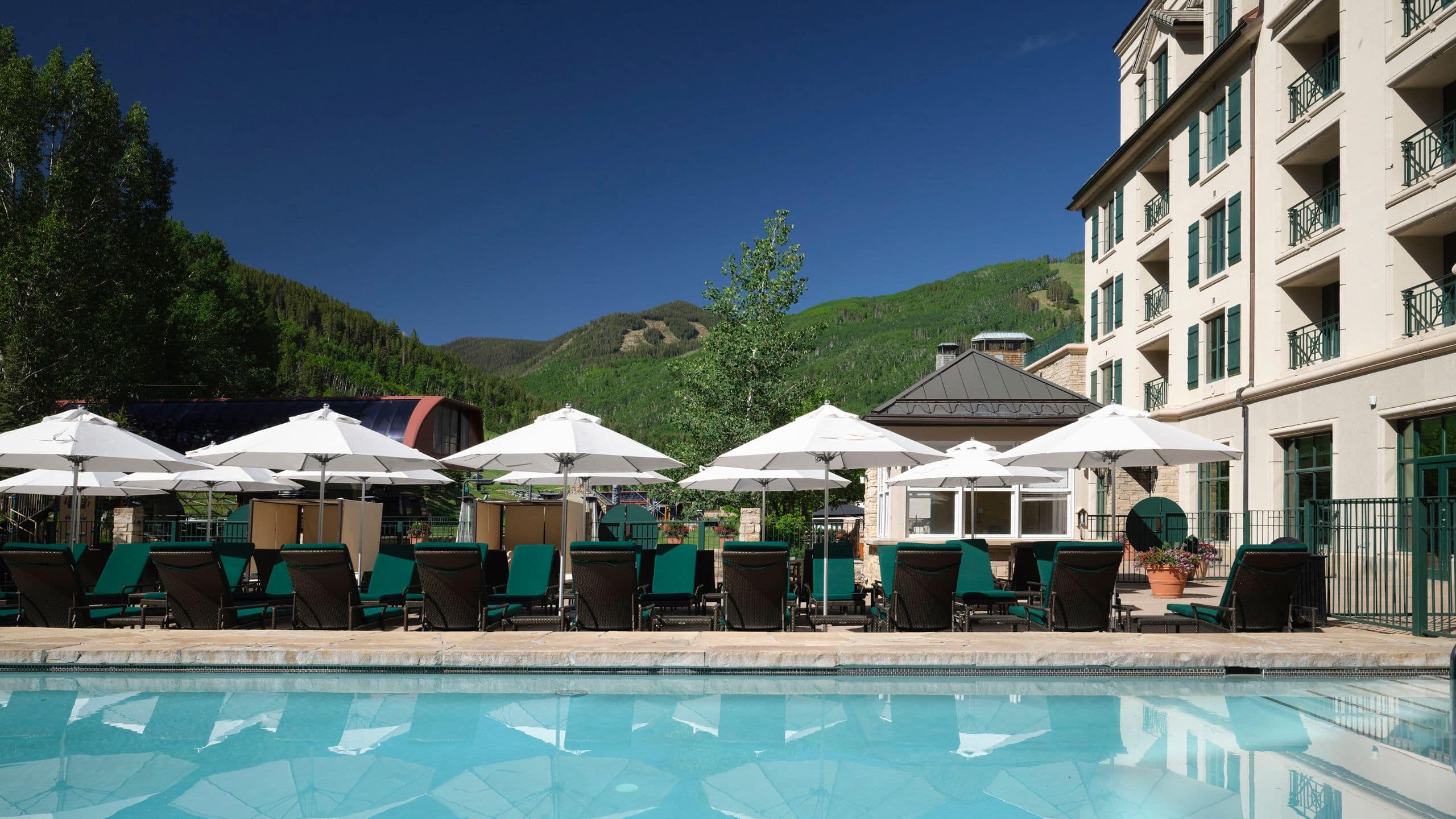 The Residences at Park Hyatt Beaver Creek Pool With Exterior And Umbrellas