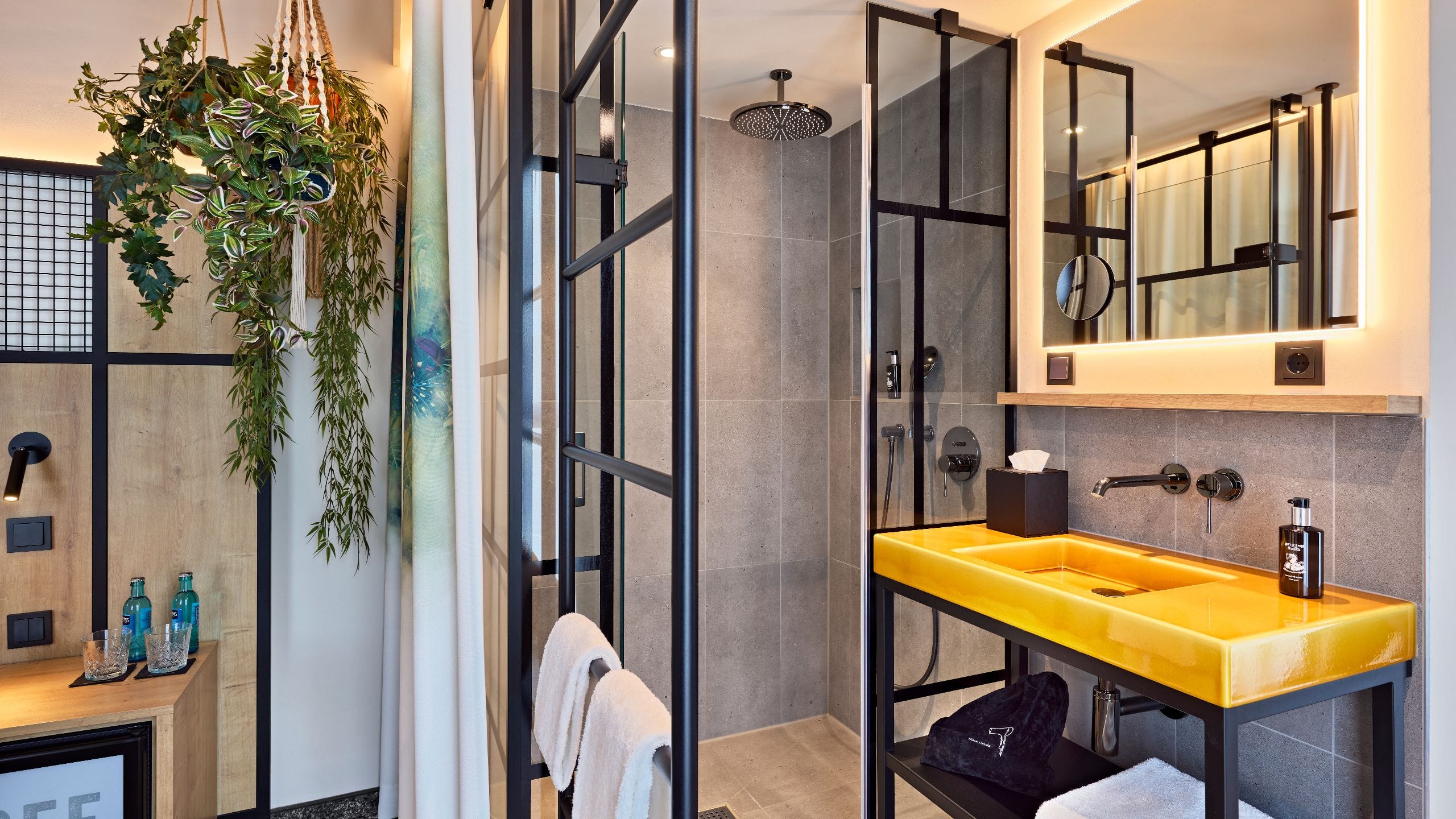 4 of 5 Me and All Hotel Ulm One King Bed Deluxe Bathroom