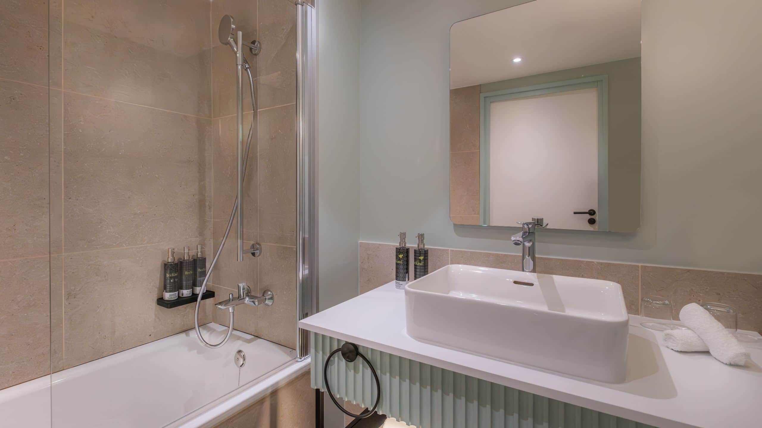 2 of 3 Hyatt Centric Reims Bathroom Vanity And Bath Tub