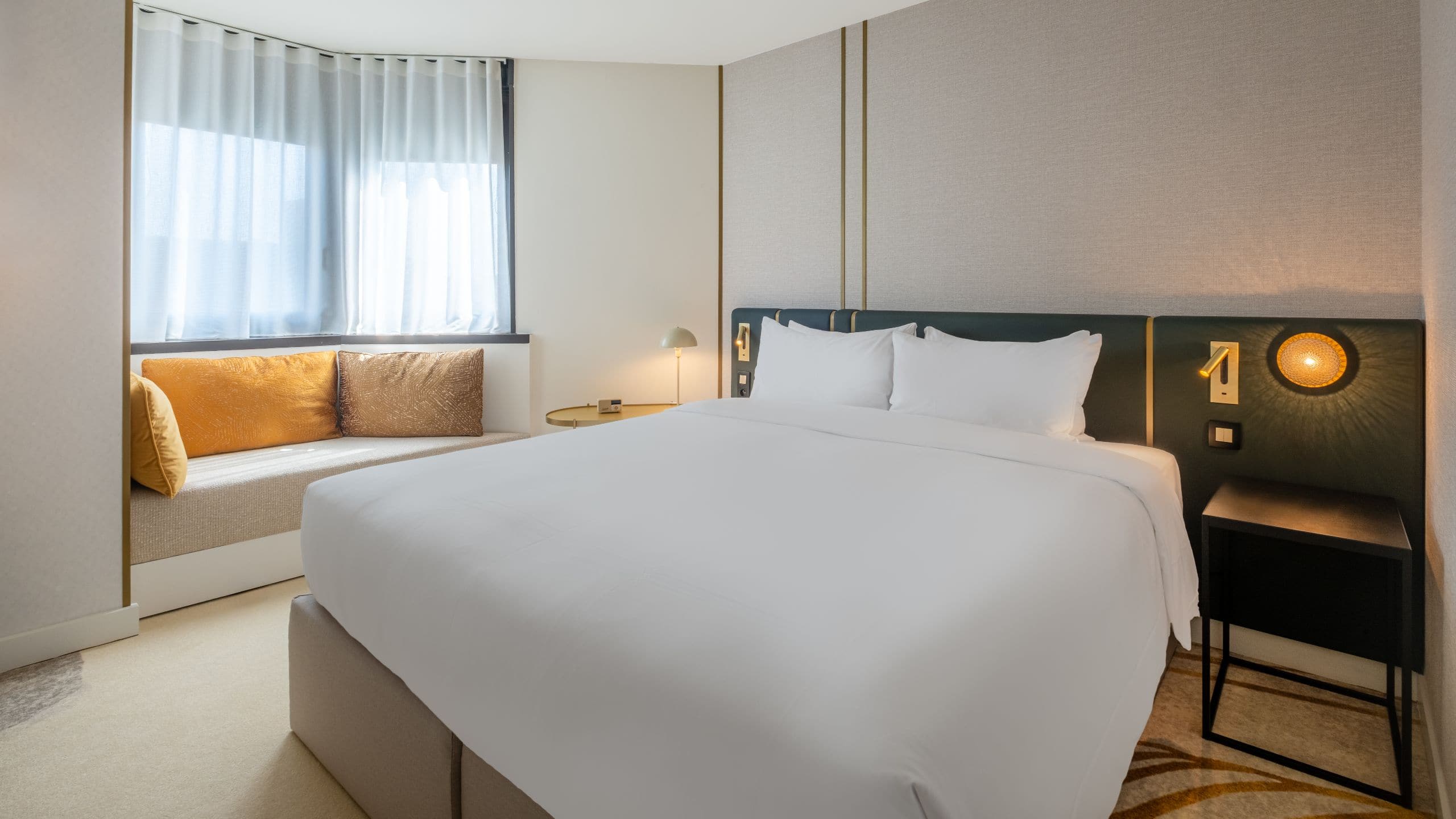 1 of 3 Hyatt Centric Reims Guestroom King Bed Angle View