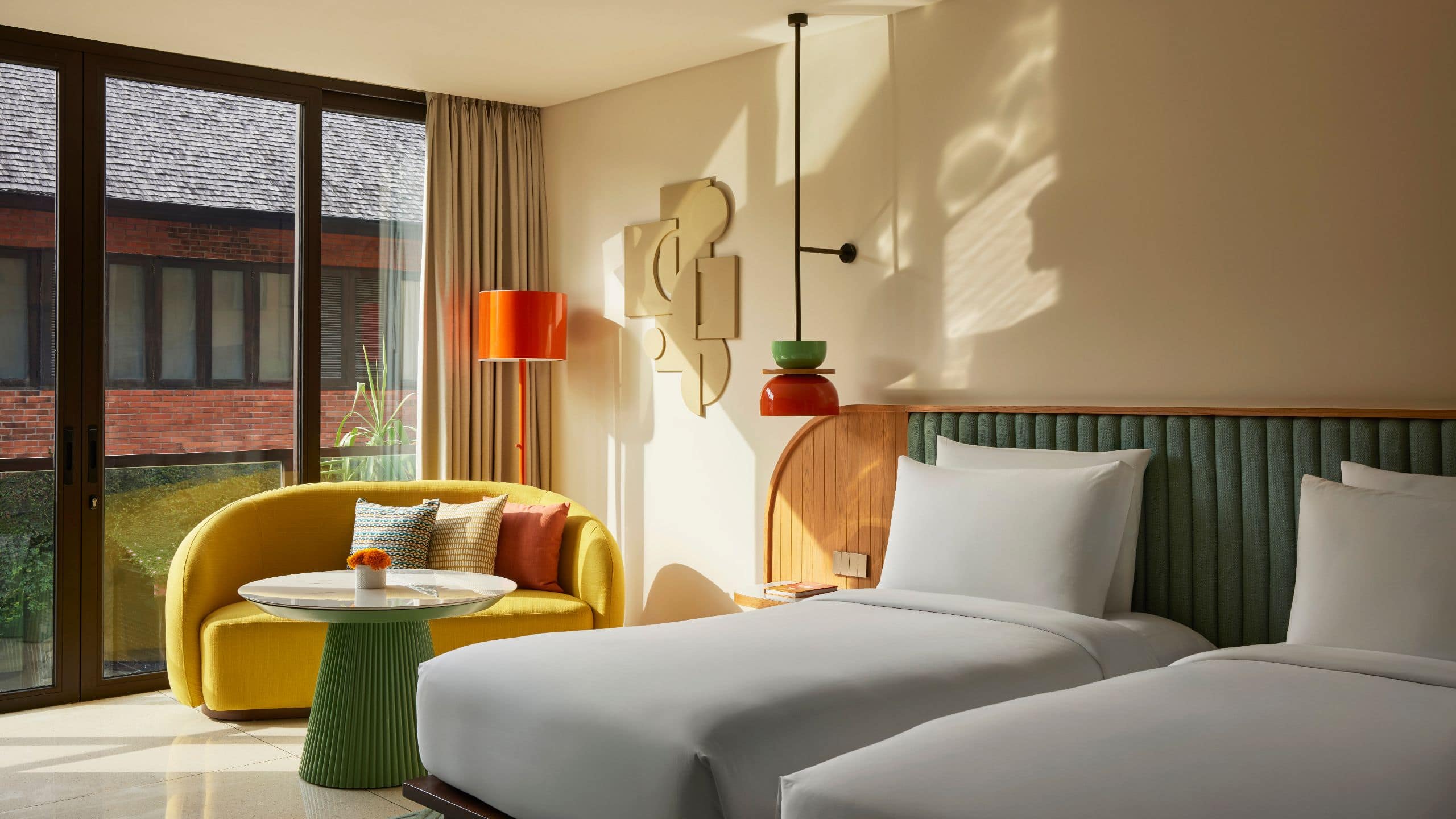 KLEO Seminyak Twin Bed Street View Window
