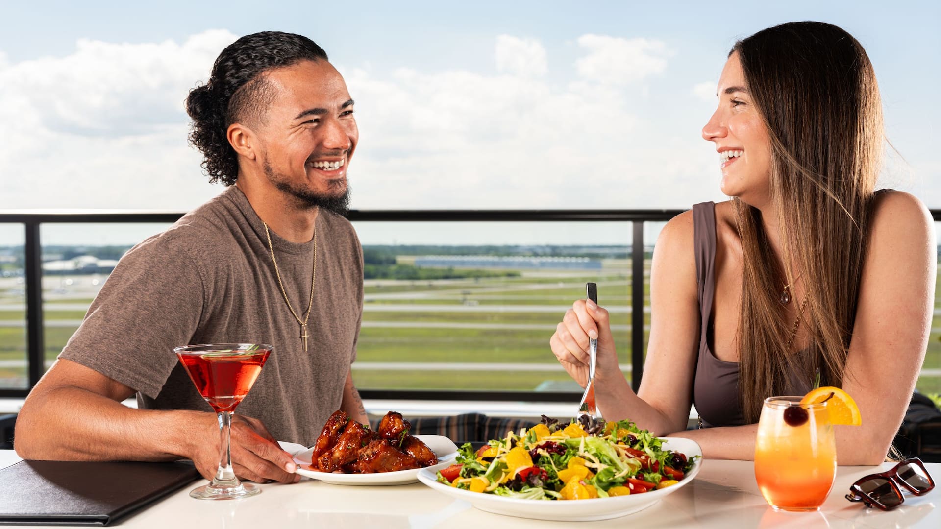 Hyatt Place Melbourne Airport Couple Dinner Runway Views