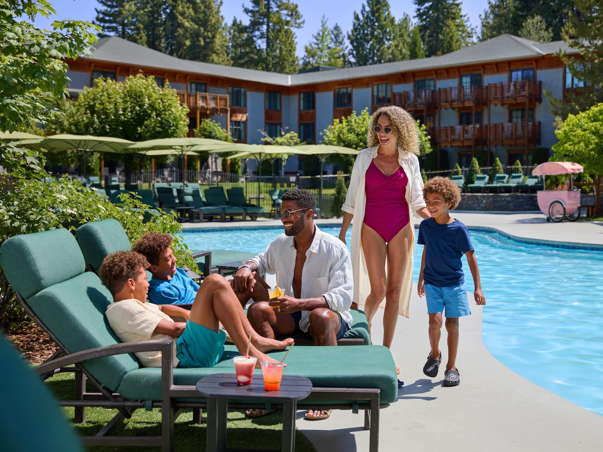 Hyatt Regency Lake Tahoe Resort, Spa and Casino Family At Pool With Lounge Chairs