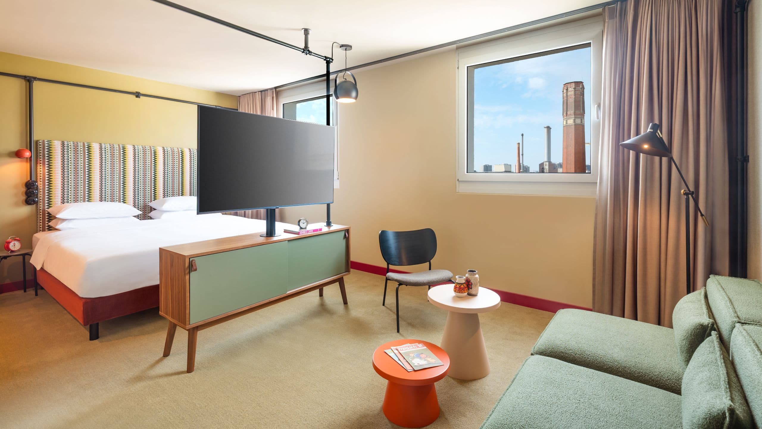 5 of 7 Me and All Hotel Berlin East Side Guestroom King View Premium Room Sofa And Bed