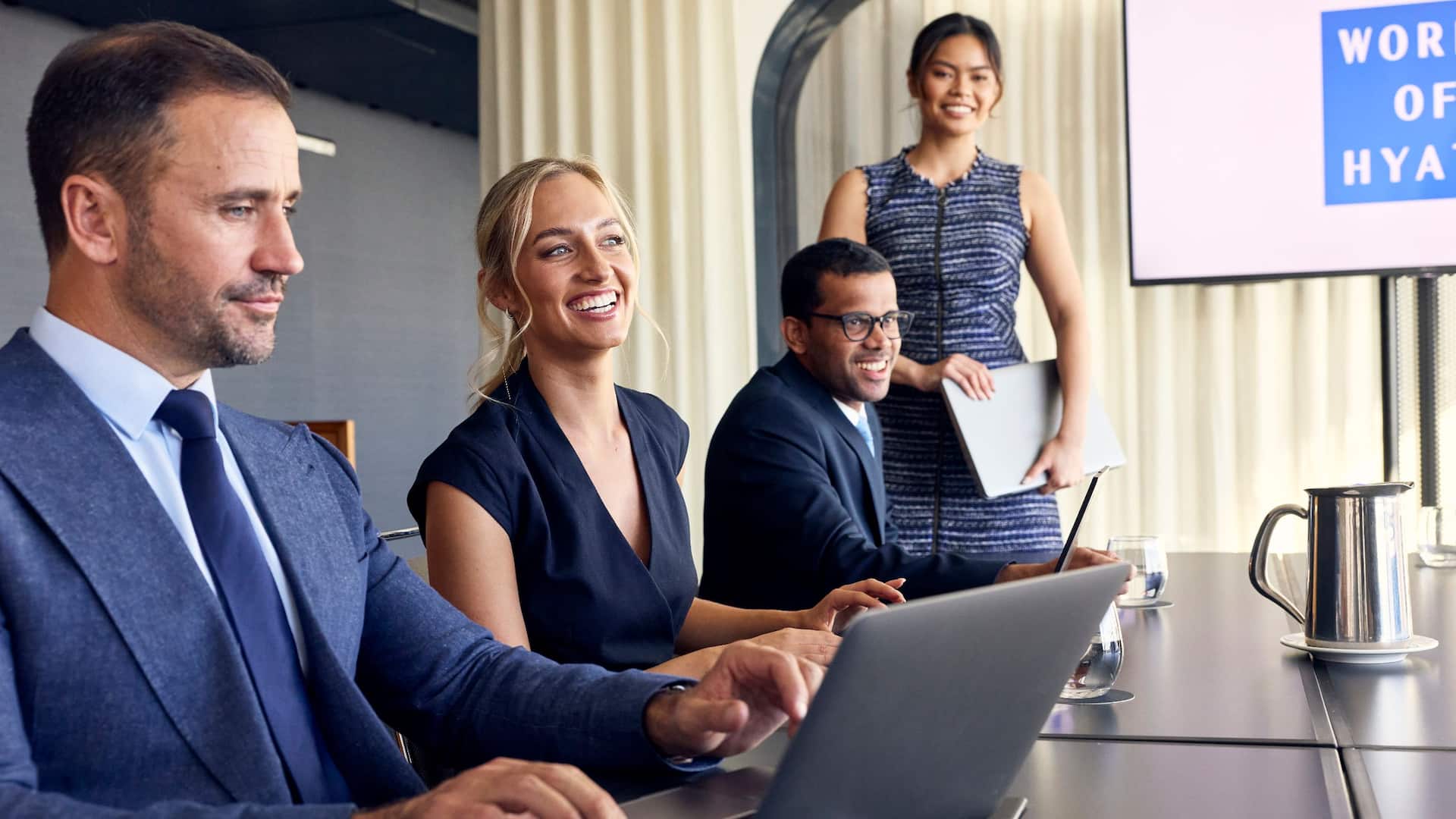 1 of 1 Global Boardroom Meeting Lady Standing