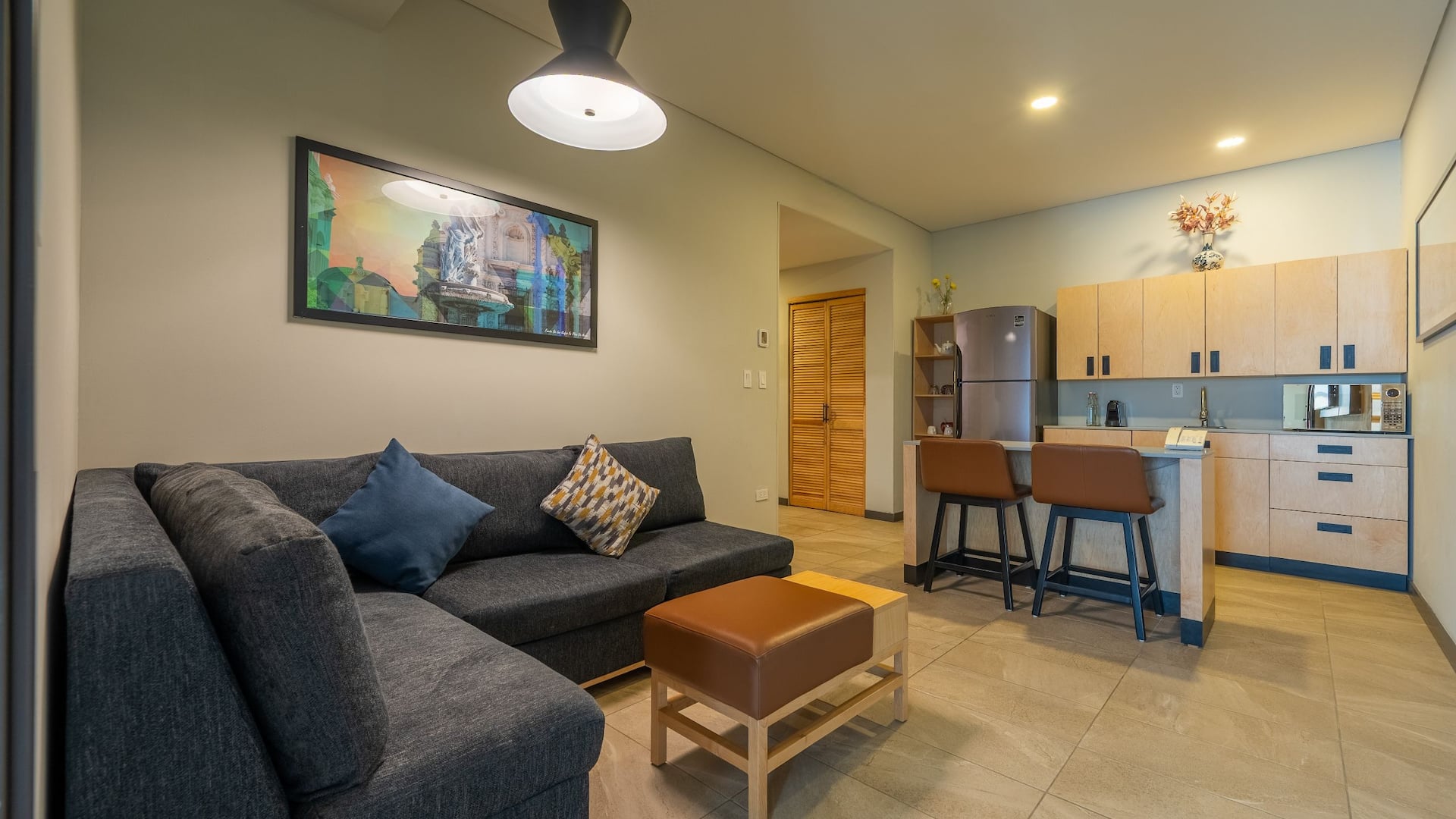 Hyatt Place Saltillo Bedroom Suite King Bed Kitchen Sofa