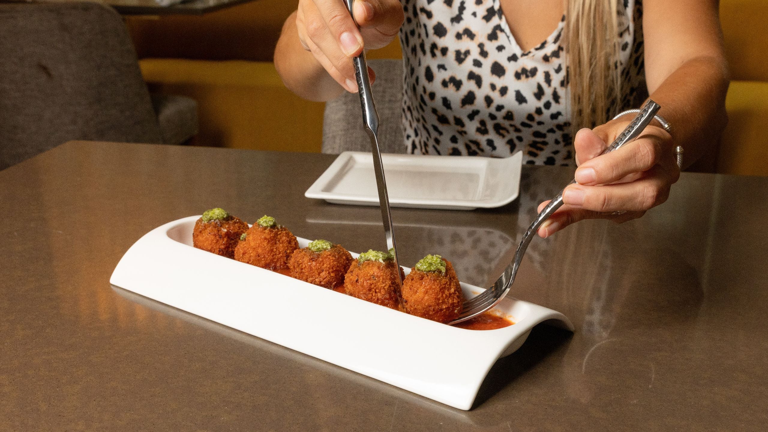 Hyatt Centric Chicago Magnificent Mile The Bridge Kitchen Guest With Arancini Plate