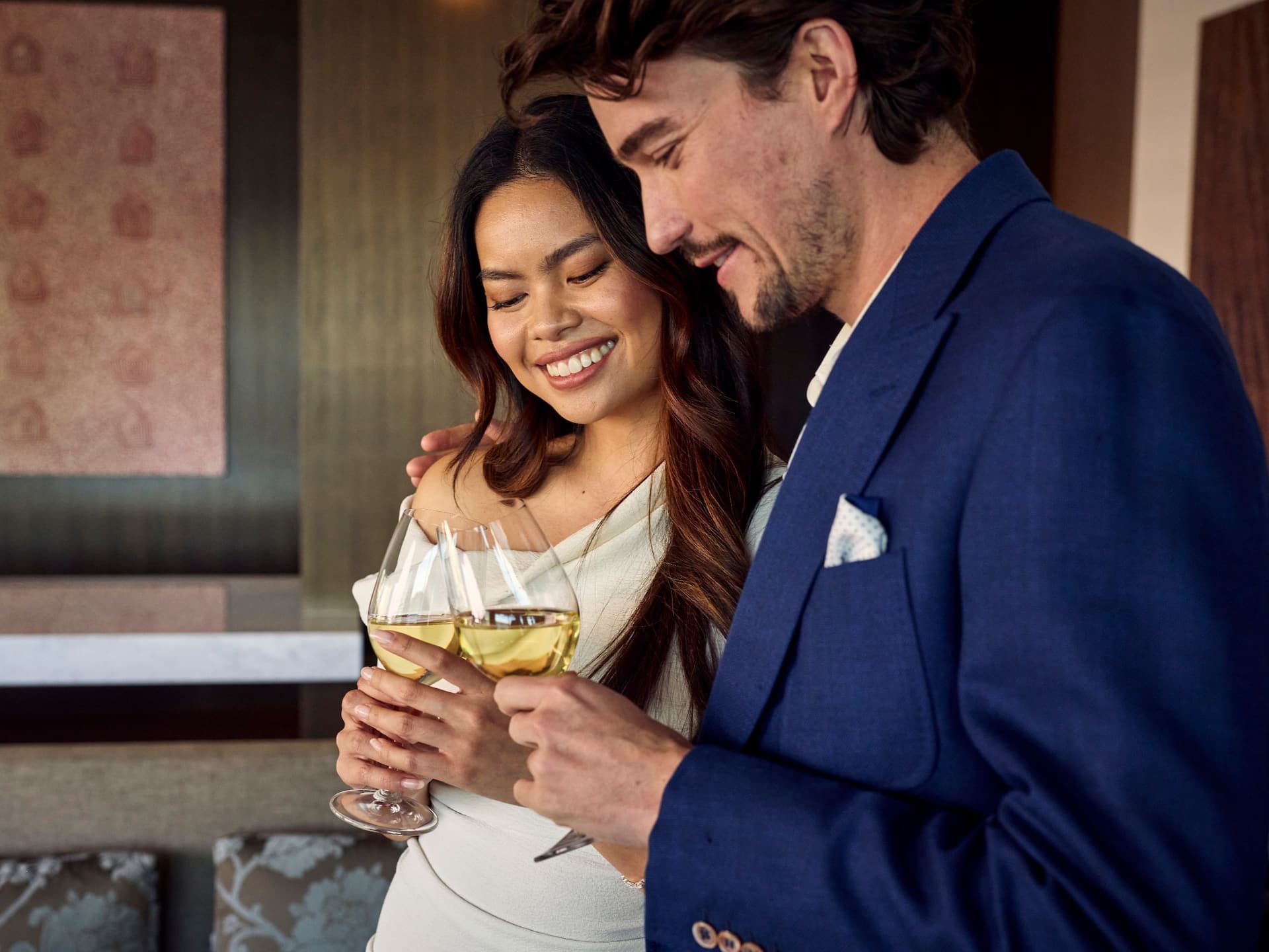 Global Couple Drinks In Room Cheers