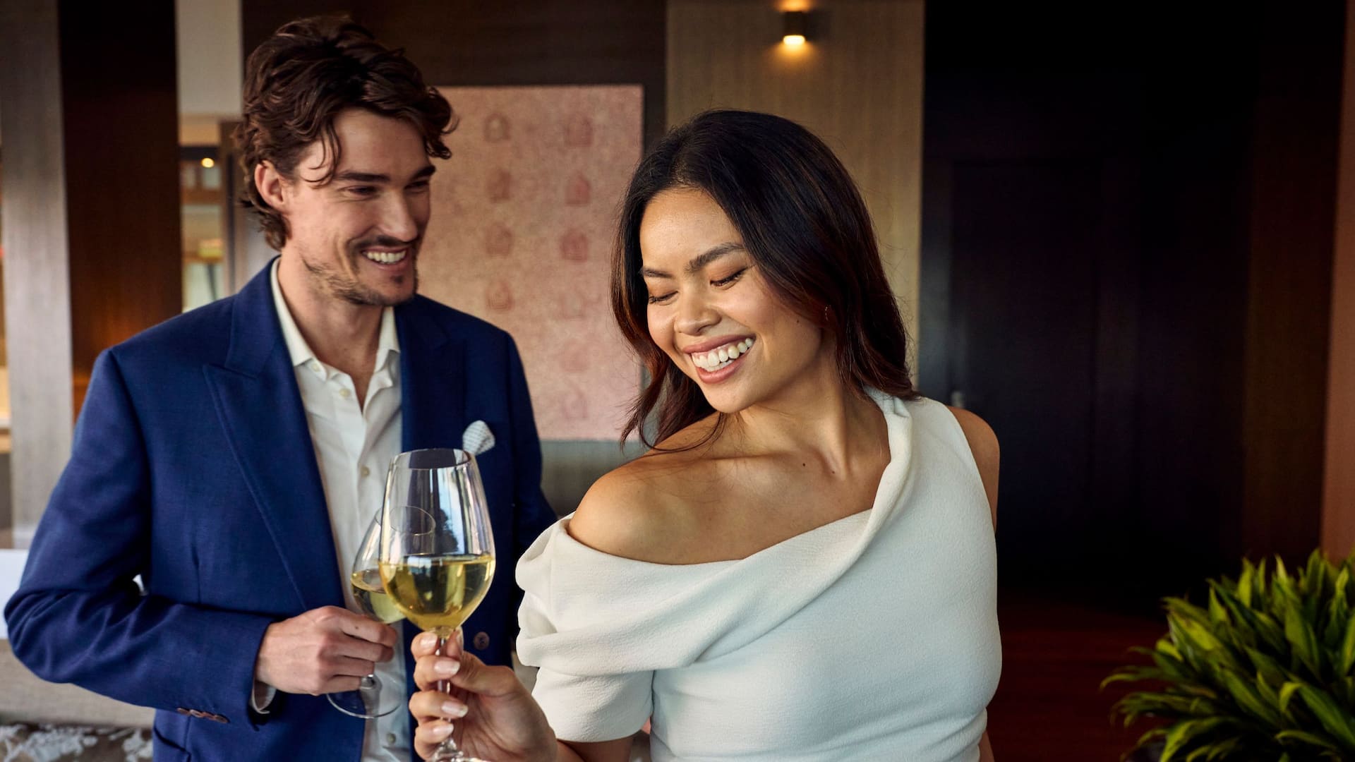 1 of 1 Global Couple Drinks Smiling Cheers