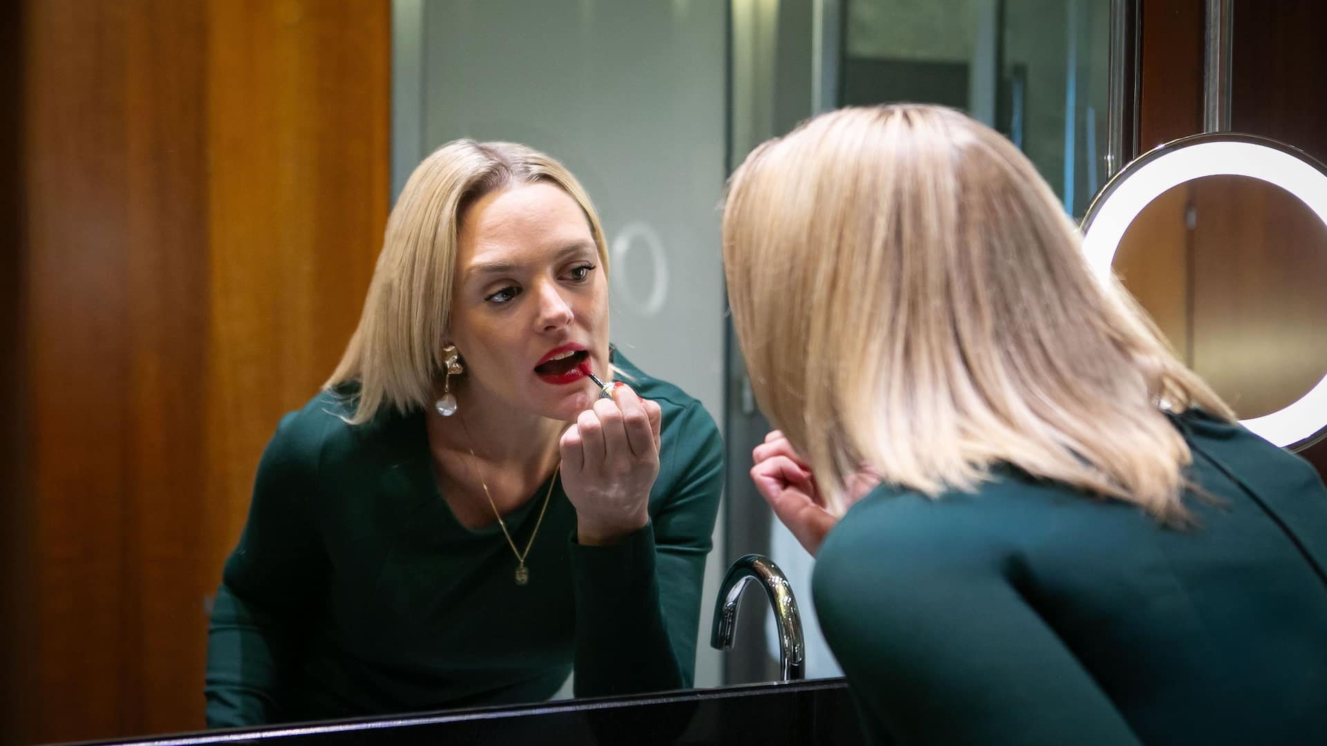 Grand Hyatt Berlin Woman Getting Ready Bathroom