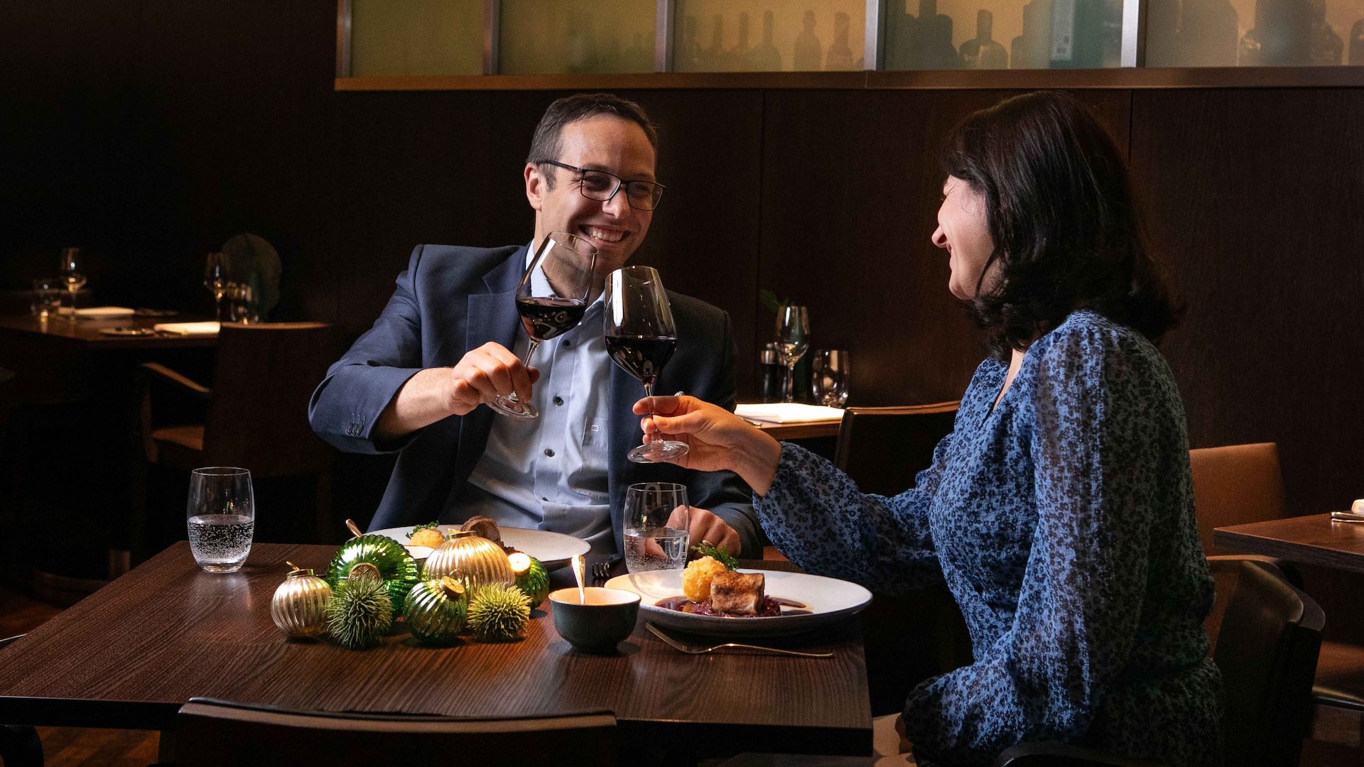 Grand Hyatt Berlin Vox Christmas Dinner Couple Red Wine