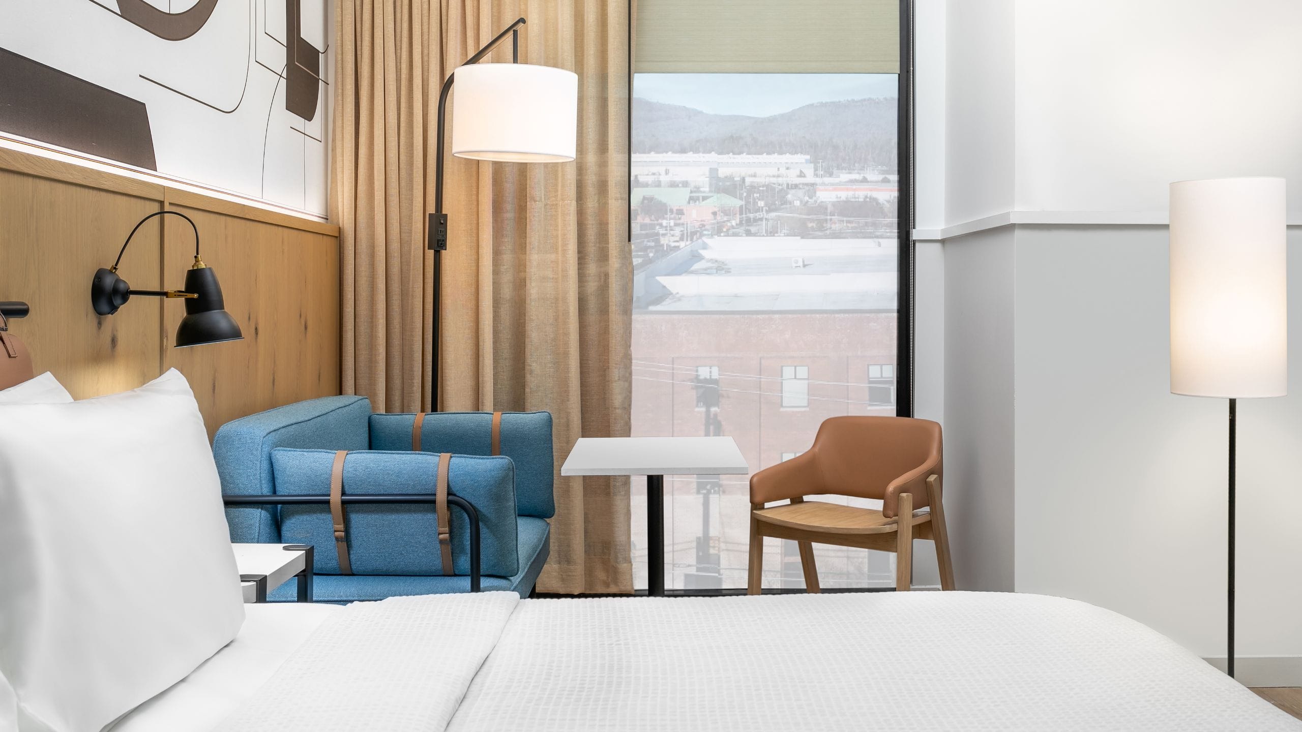 Caption by Hyatt Chattanooga Downtown Guestroom Seating And Window Area