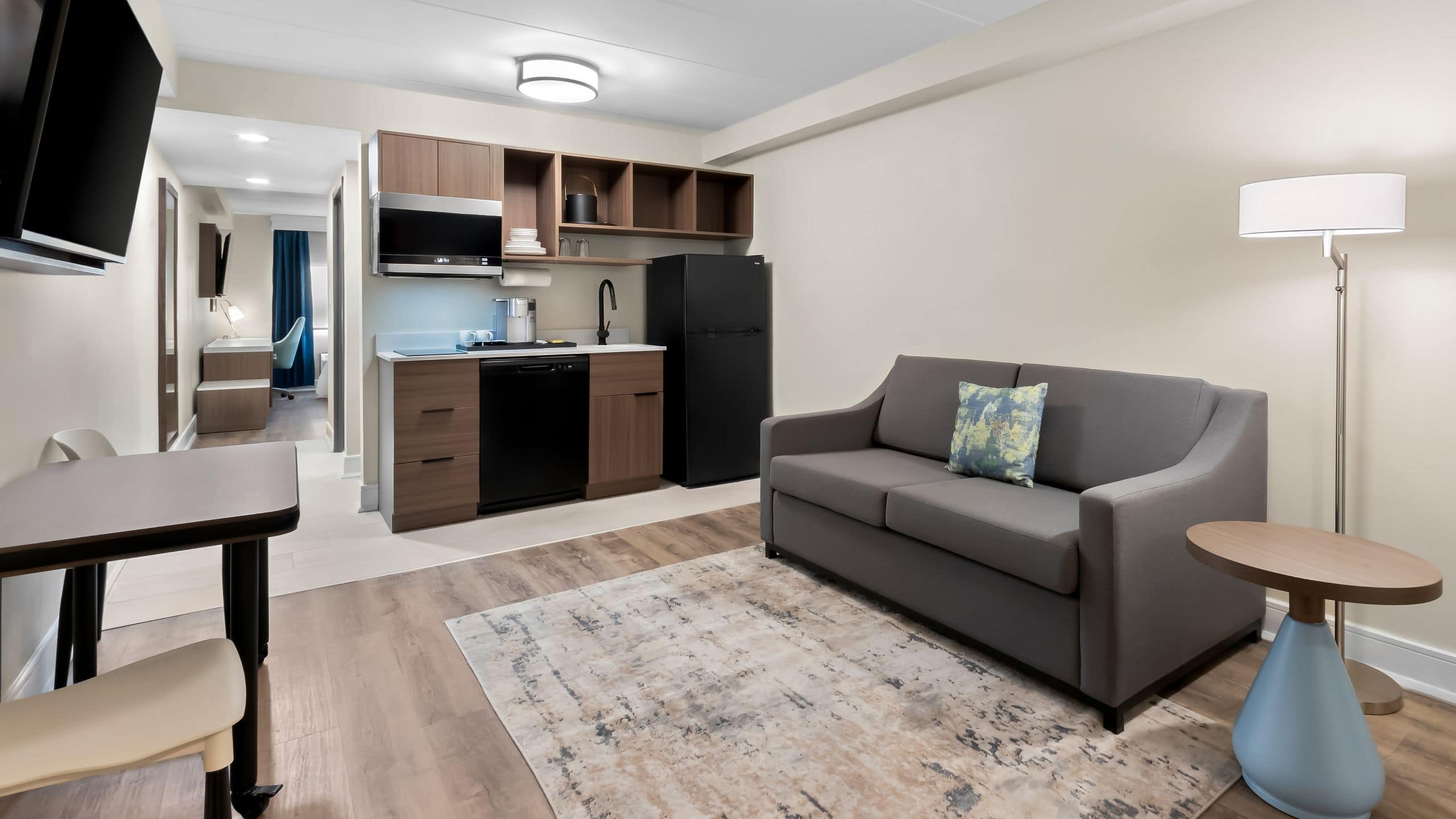 Latitude Suites Tinton Falls Guestroom Kitchenette And Living Room Area