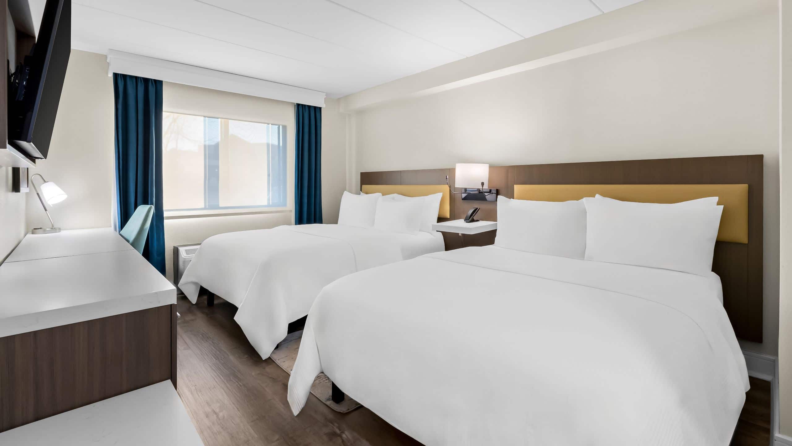 Latitude Suites Tinton Falls Two Queens Guestroom